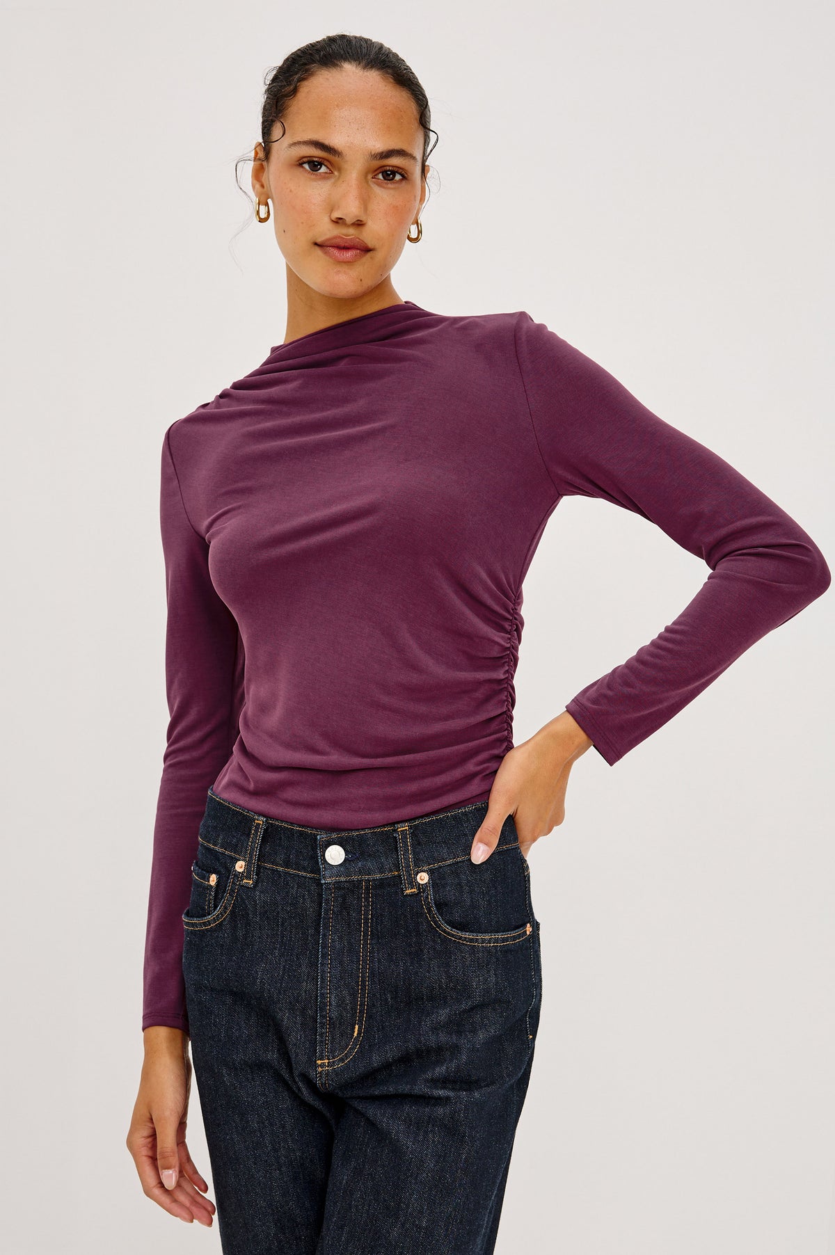 Joelle Top in Brushed Jersey With Draped Mock Neck, Shirring at Shoulder and Side, Long Sleeves, and Fitted Silhouette in Wine Colorway - Front Crop View Featured on Model.