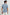 Johnny Short Sleeve T-Shirt with a Crew Neck, Chest Patch Pocket and Small Slits at the Side Hems in Steel Colorway - Back View Featured on Model