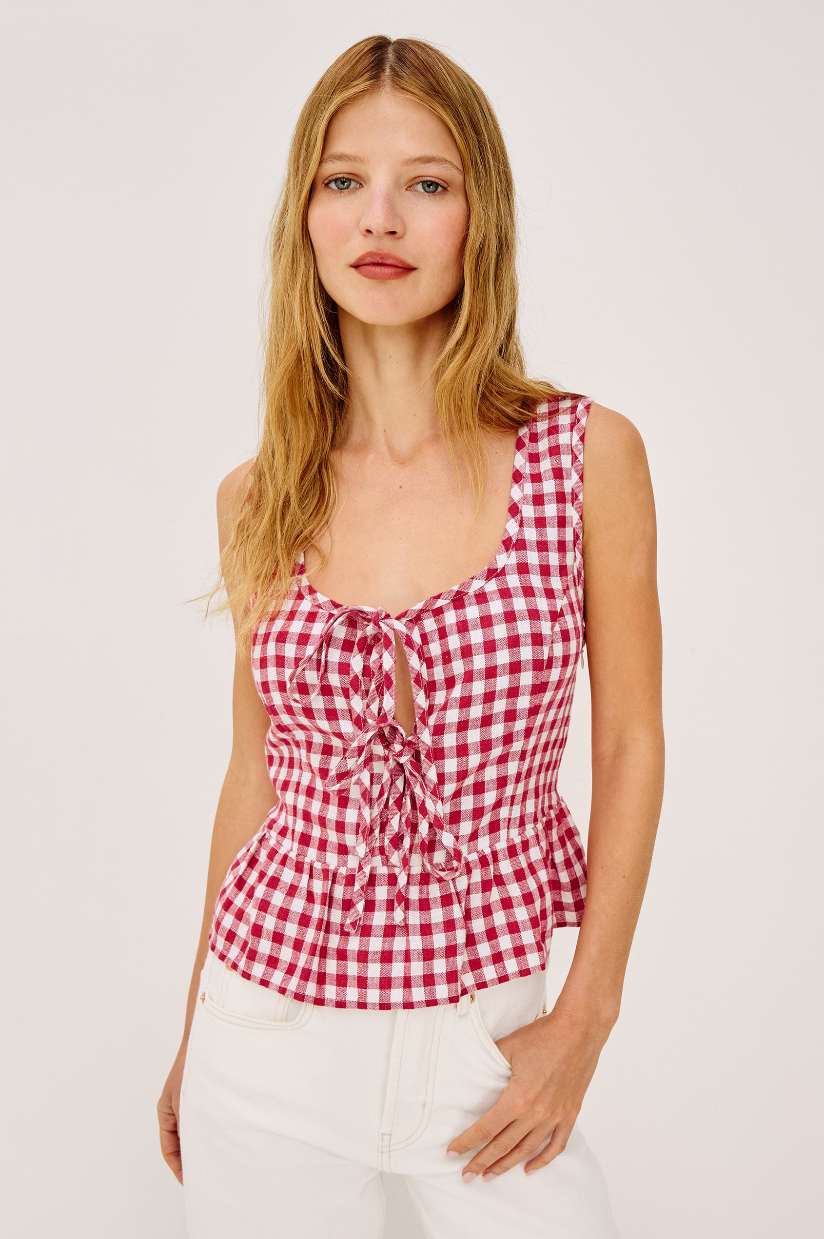 Jonah Crop Top in Linen With Plunging Front With Self-Ties, Side Seam Zipper, Front Princess Seams, and Peplum Hem in Picnic Check Colorway - Upper Body Front View Featured on Model
