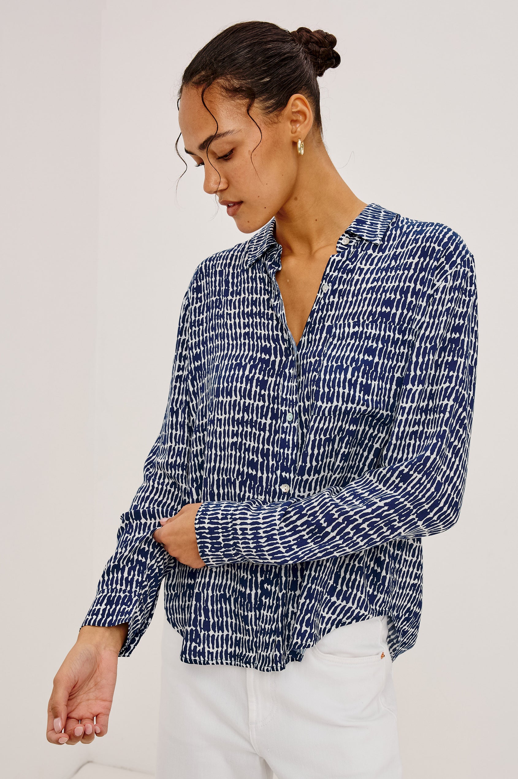 Josephine Button-Up Shirt in Feather Rayon With Collar, Long Sleeves, Relaxed Fit, And Chest Pocket in Navy Pebbled Colorway - Upper Body Front View Featured on Model
