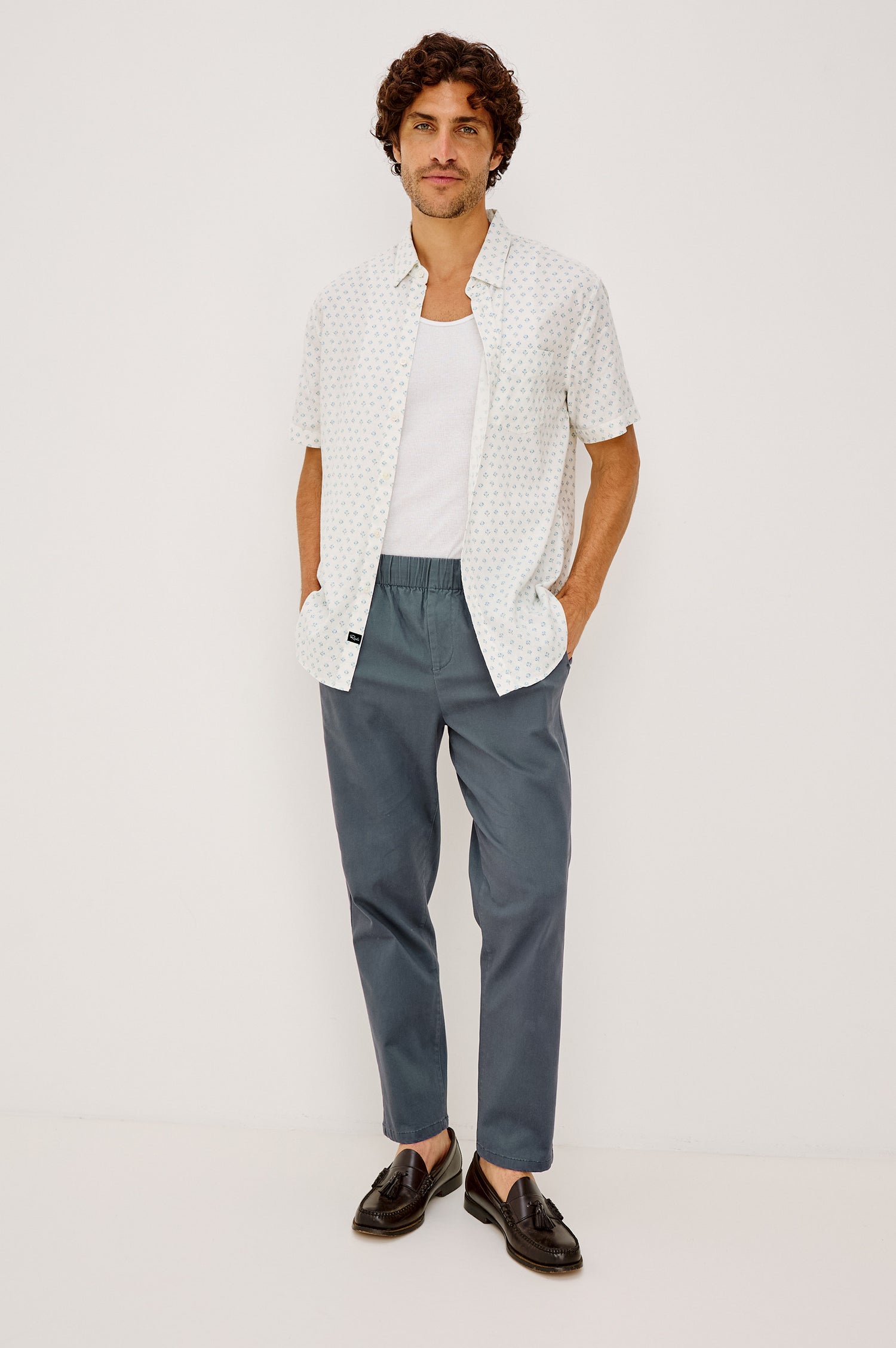 Julian Pant in Cotton Blend With Relaxed Straight Fit, Elastic Waist, and Back Welt Pockets Faded Blue Colorway - Full Body Front View Featured on Model