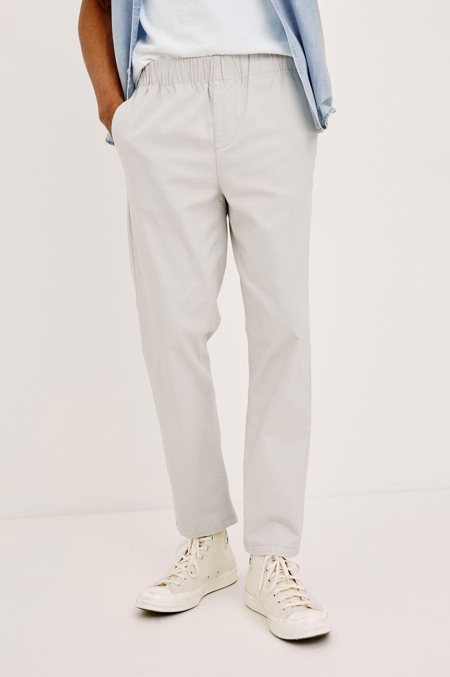 Julian Pants with an Elastic Waist, Two Front Pockets and Two Back Welt Pockets in Natural Colorway - Front View Featured on Model