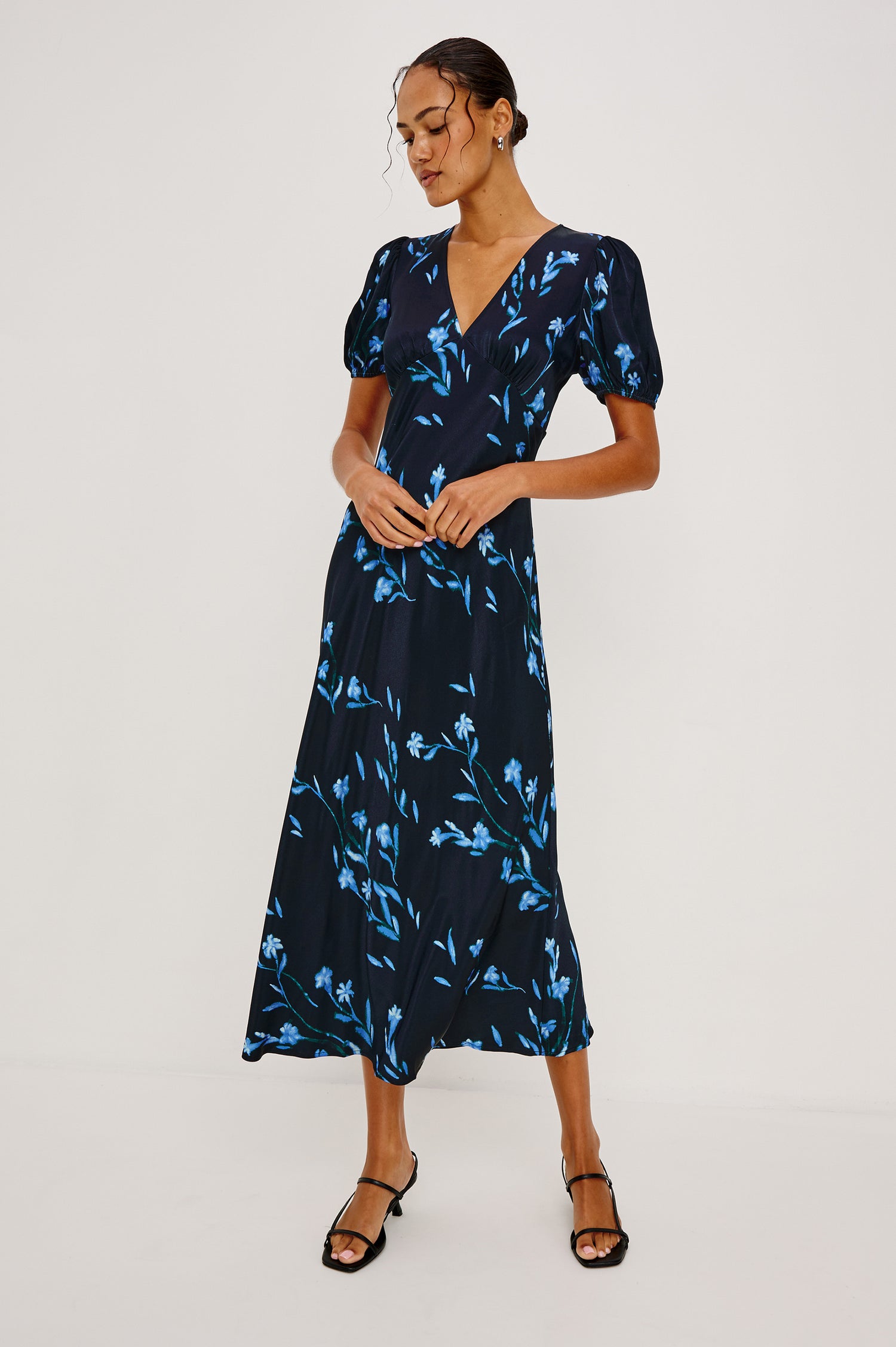 Junia Midi Dress in Satin Back Crepe With V-Neckline, Short Puff Sleeves, and Slip-on Design in Blue Carnation Colorway - Upper Body Front View Featured on Model