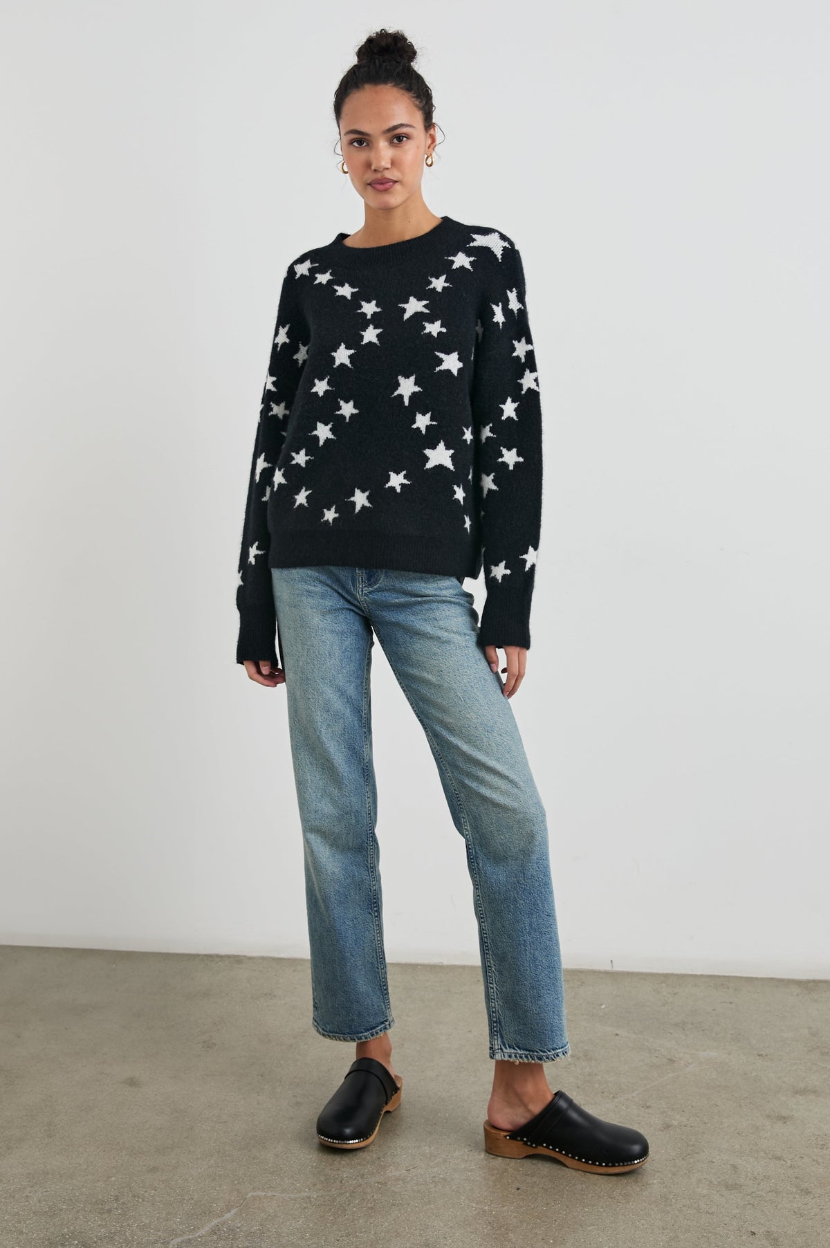 Kana Long-Sleeve Sweater with a Crew Neck in Star Chain Colorway, White Stars on Black - Front Full Body View Featured on Model 
