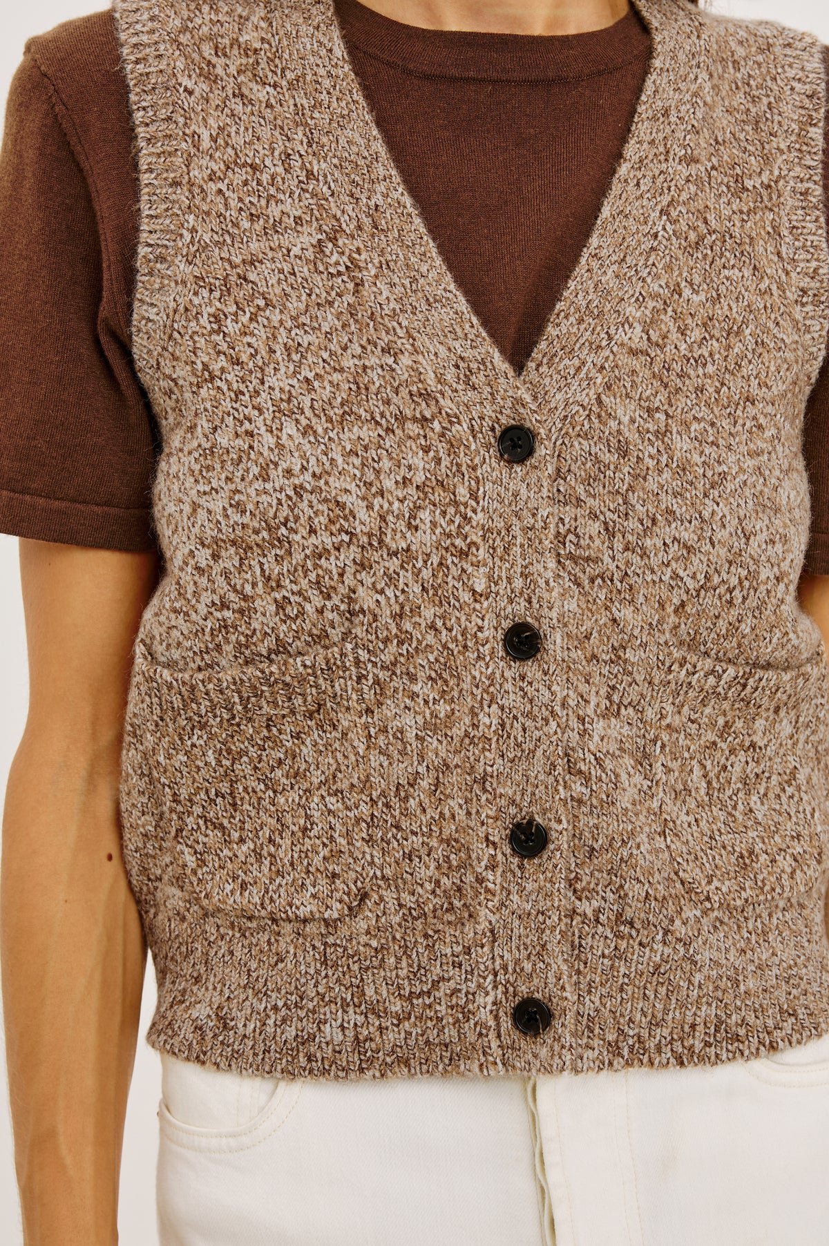 Kasmir Sleeveless Vest in Recycled Poly Knit Blend With V-Neckline, Front Buttons, and Front Patch Pockets in Brown Melanga Colorway - Upper Body Front View Featured on Model