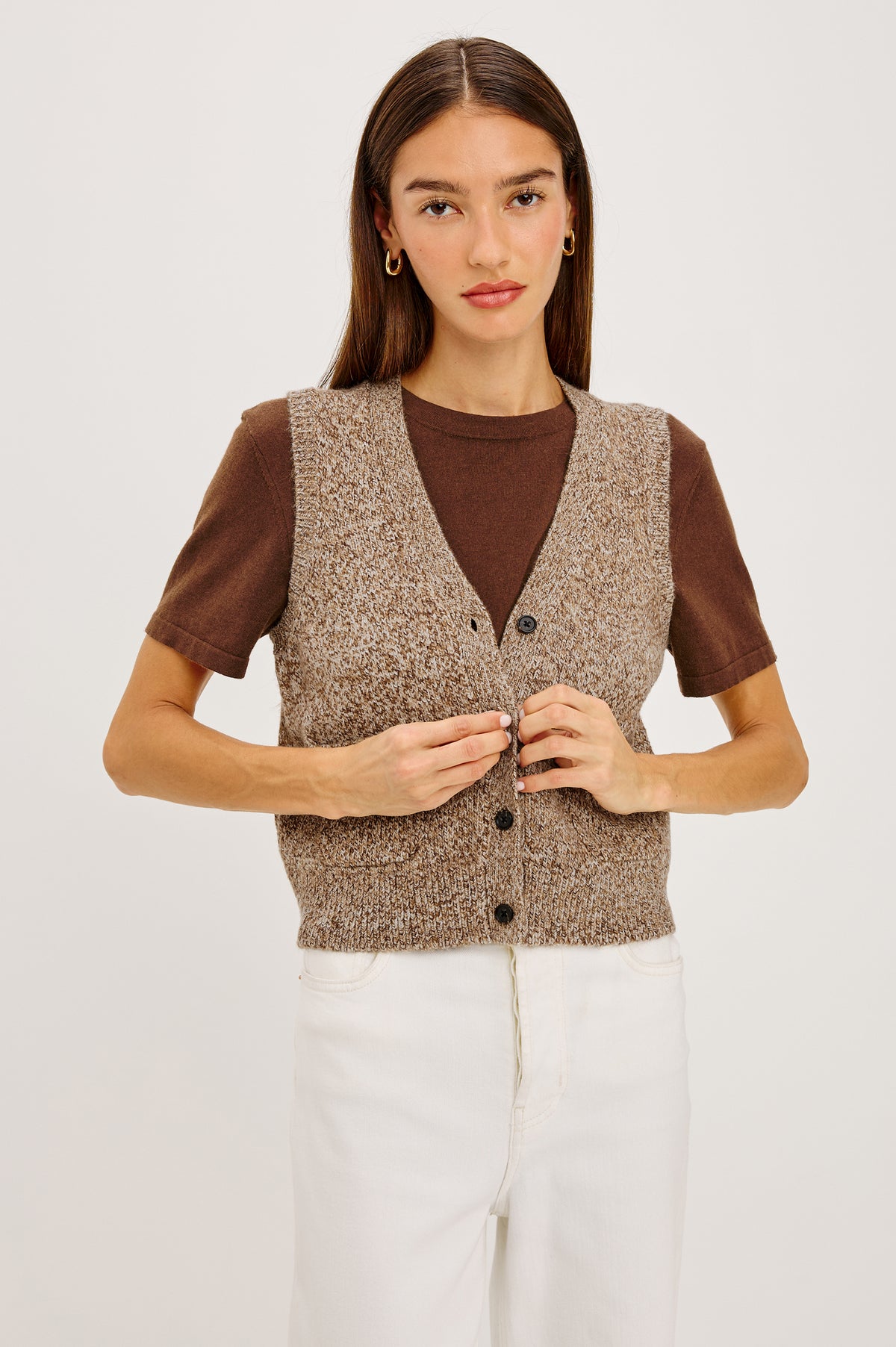 Kasmir Sleeveless Vest in Recycled Poly Knit Blend With V-Neckline, Front Buttons, and Front Patch Pockets in Brown Melanga Colorway - Upper Body Front View Featured on Model