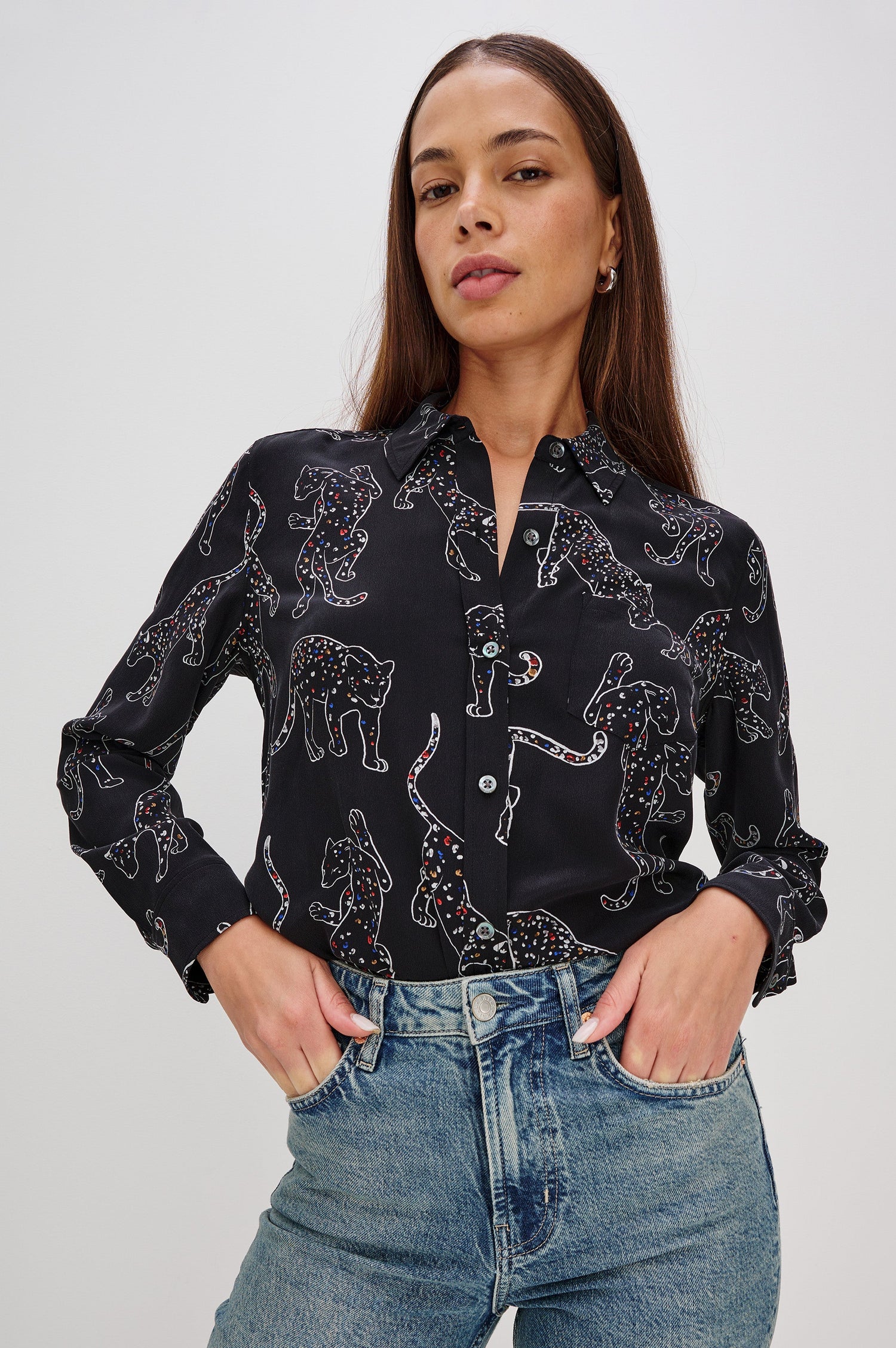 Washed silk button-down shirt in ivory with a horse print. The shirt has a soft drape and classic collar for a polished look. Front View on Model.