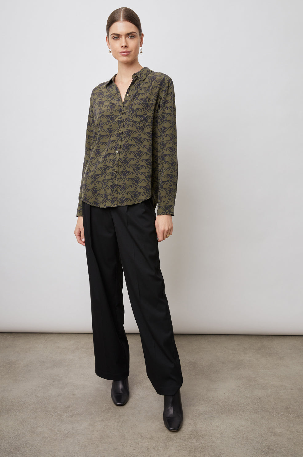 Kate Long Sleeve Button up with a Chest Patch Pocket in Olive Stargaze Colorway, Black Stars on Olive  - Front Full Body View Featured on Model