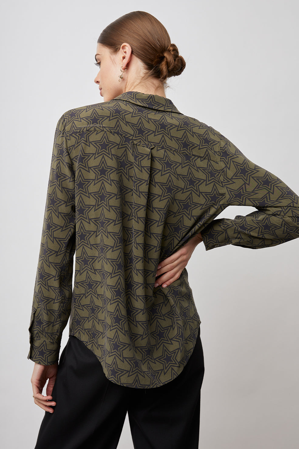 Kate Long Sleeve Button up with a Chest Patch Pocket in Olive Stargaze Colorway, Black Stars on Olive  - Back View Featured on Model