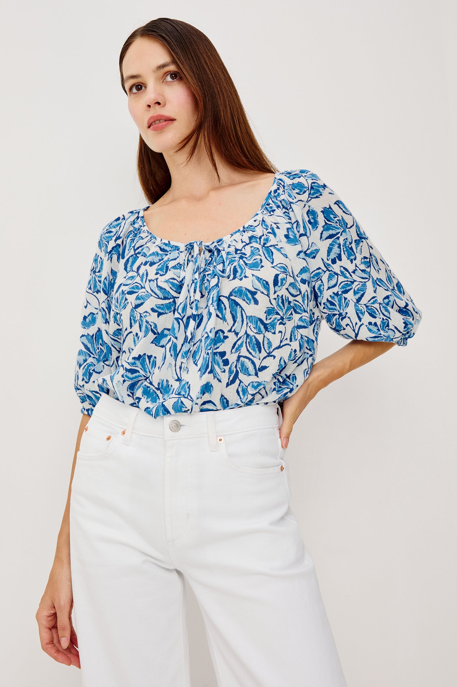 Kirstie Linen Top With Wide Scoop Neckline and Self-Ties Elbow-Length Raglan Sleeves With Elastic Cuffs and Loose Fit in Azure Jasmine Colorway - Upper Body Front View Featured on Model