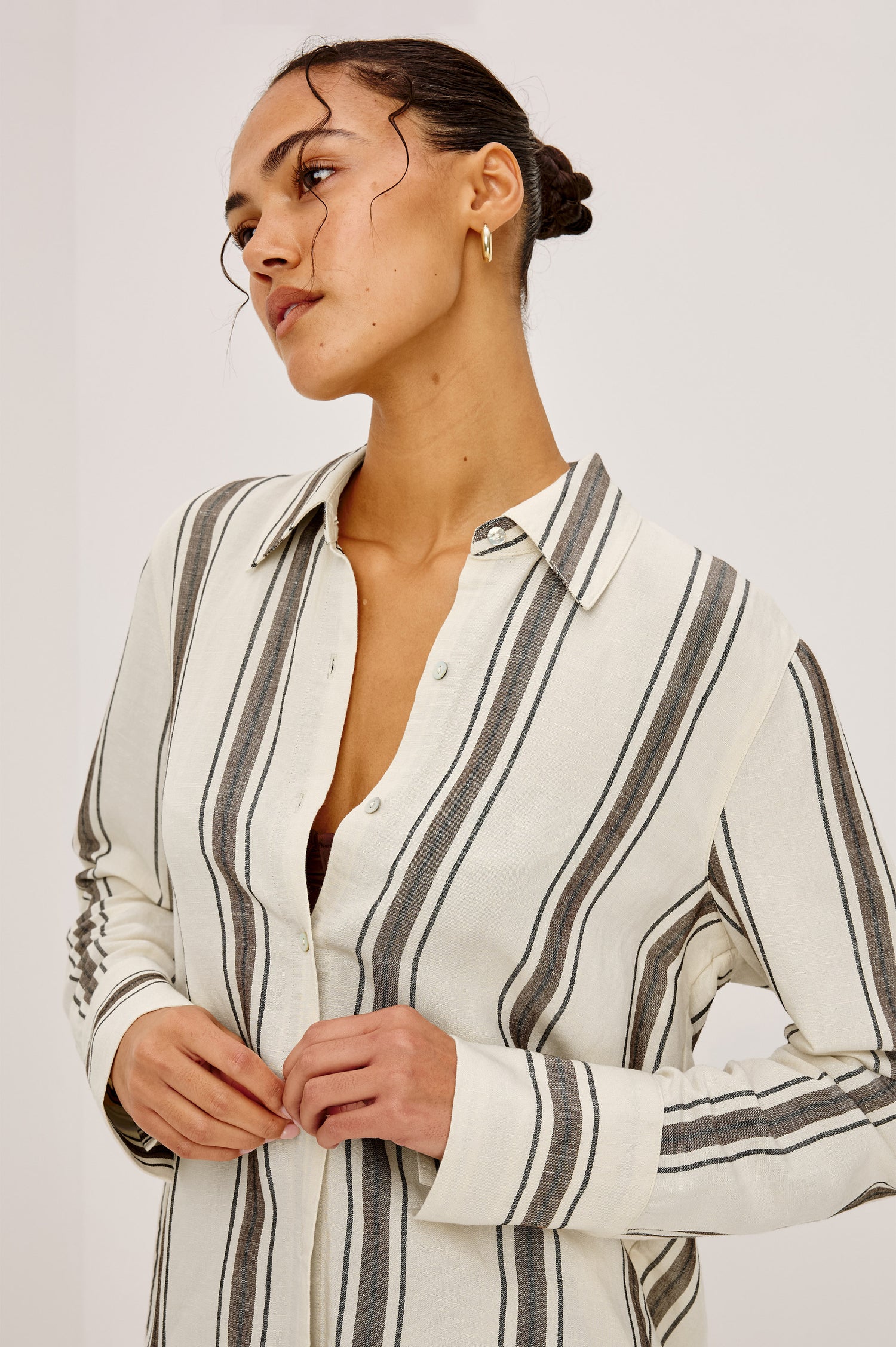 Knox Button-Up Shirt in Linen Viscose With Collar, Front Buttons, Long Sleeves, and Relaxed Fit in Sequoia Stripe Colorway - Upper Body Front View Featured on Model