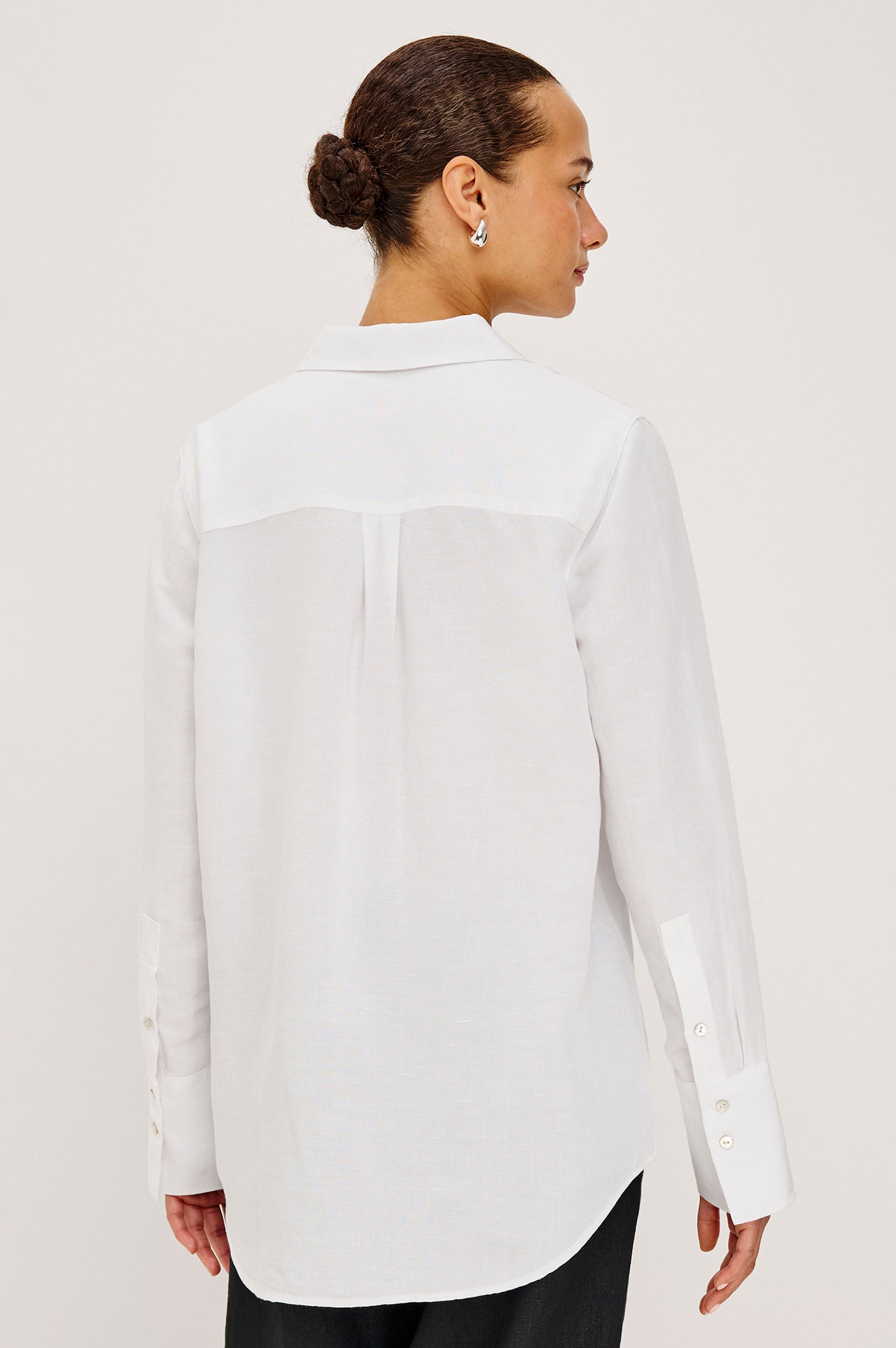Knox Button-Up Shirt in Linen Viscose With Collar, Front Buttons, Long Sleeves, and Relaxed Fit in White Colorway - Upper Body Back View Featured on Model