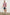 Laguna cotton lid-length short with front button closure and belt loops - full body front view on model