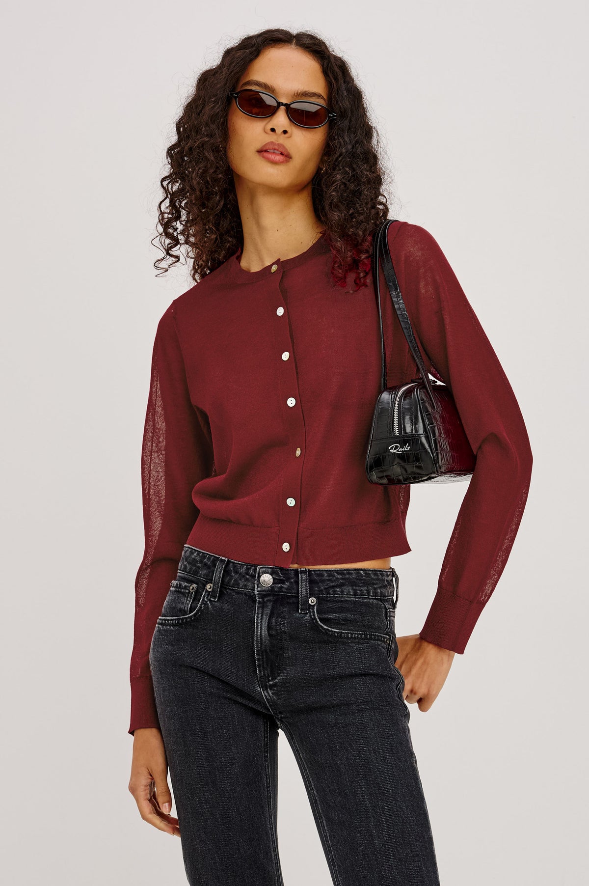 Lakelyn Cardigan in Sheer Fine-Gauge Knit With Slightly Cropped, Boxy Fit, Crew Neck, Front Button Closures, and Long Sleeves in Crimson Colorway - Upper Body Front View Featured on Model