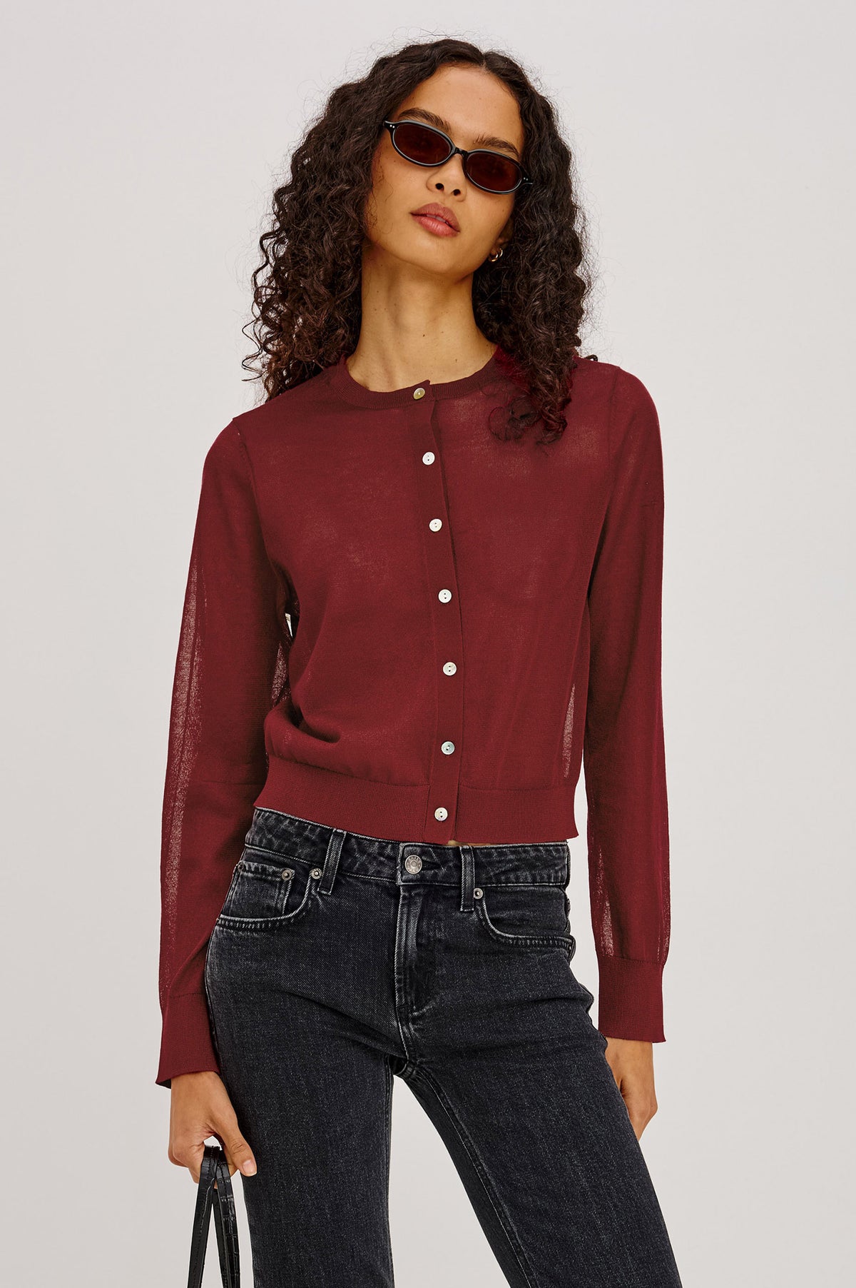 Lakelyn Cardigan in Sheer Fine-Gauge Knit With Slightly Cropped, Boxy Fit, Crew Neck, Front Button Closures, and Long Sleeves in Crimson Colorway - Upper Body Front View Featured on Model