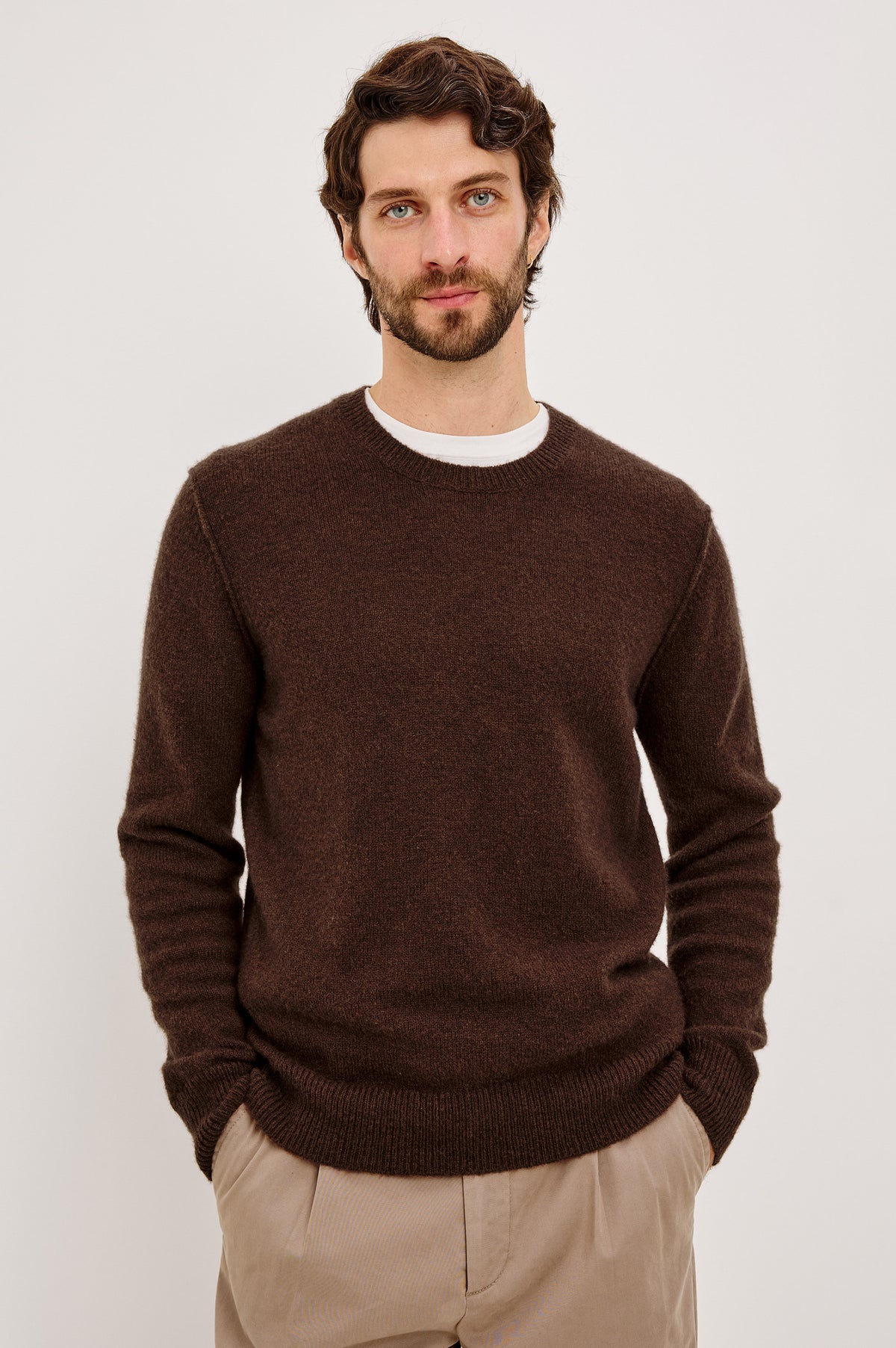 Laurent Sweater in Merino Wool Cashmere Blend With Relaxed Fit, Reversed Linking Seams at Arm Holes, and Long Sleeves in Chestnut Colorway - Upper Body Front View Featured on Model