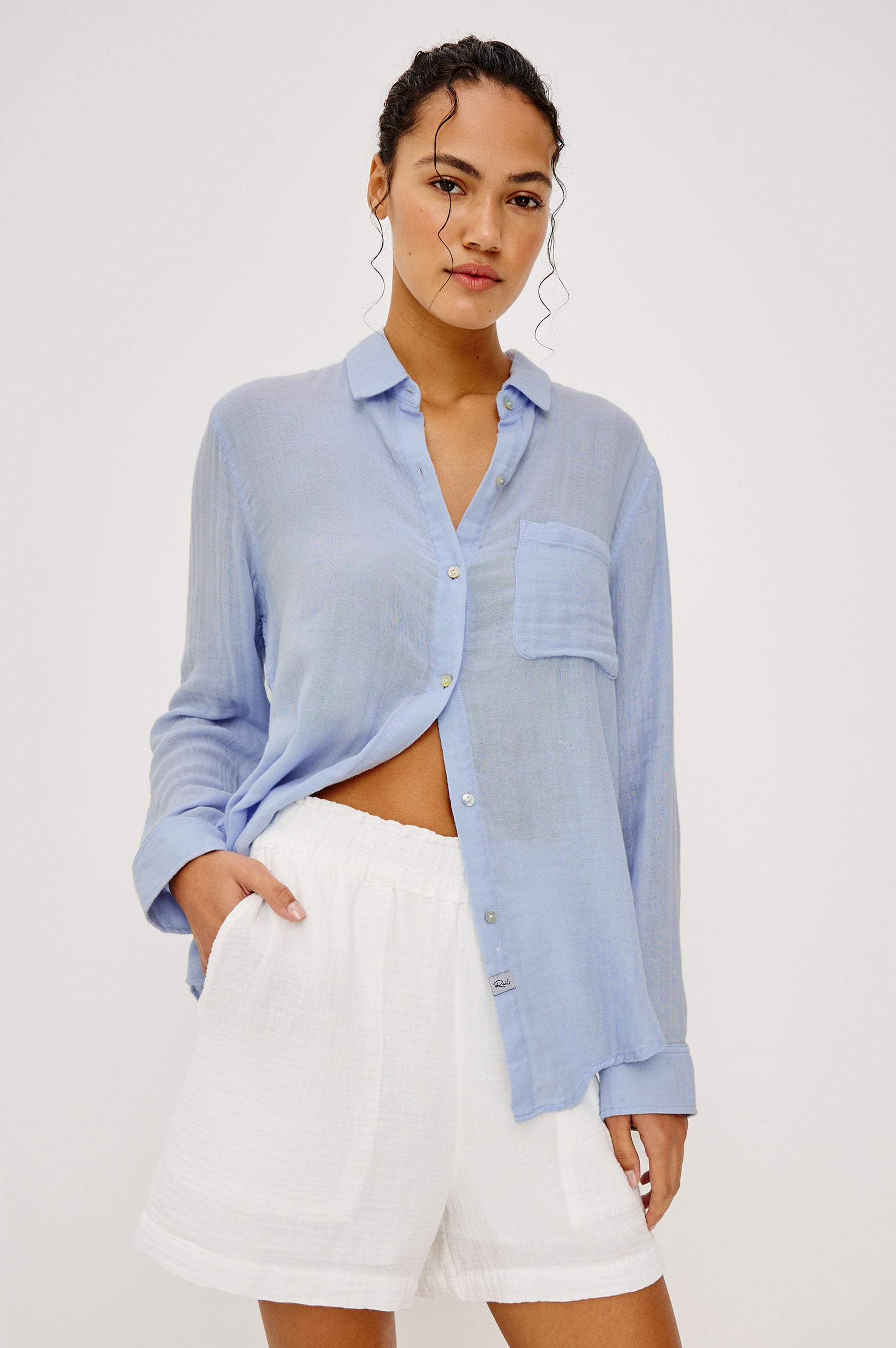 Leighton Shorts with Textured Fabric, a Smocked Elastic Waist, and Large Front Pockets in White Colorway - Upper Body Front View Featured on Model