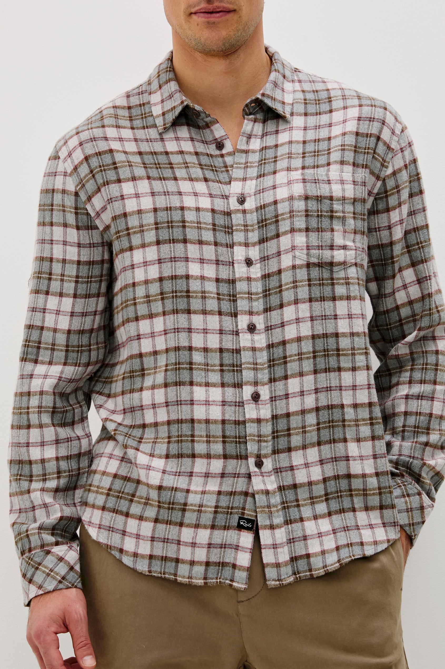Lennox Long-Sleeve Button Up with a Chest Patch Pocket in Charcoal Autumn Melange Colorway, a plaid in Charcoal, Burnt Orange and White - Front Detail View Featured on model