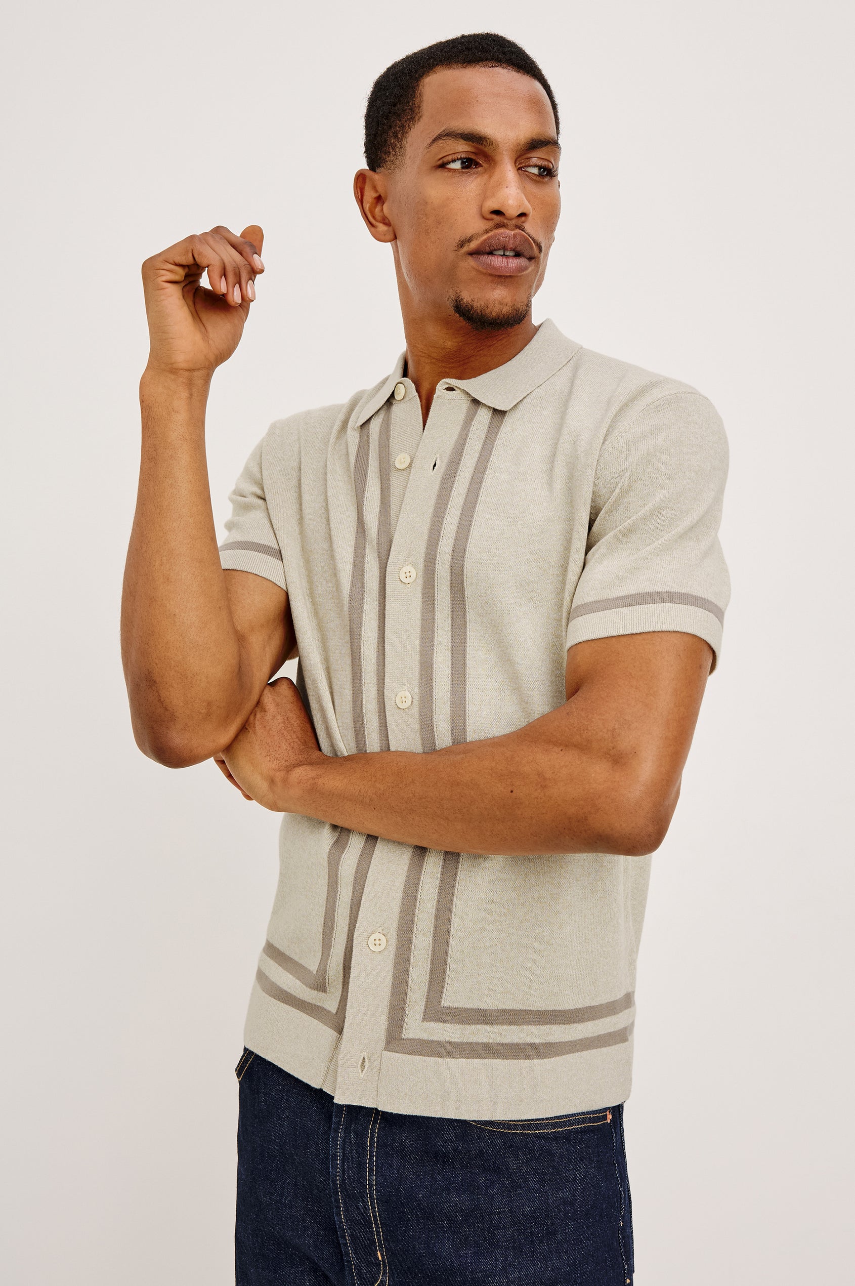 Leo Knit Sweater Polo in Yarn-Dyed Cotton Blend With Collar, Front Buttons, and Short Sleeves in Driftwood Melange Colorway - Front View Featured on Model