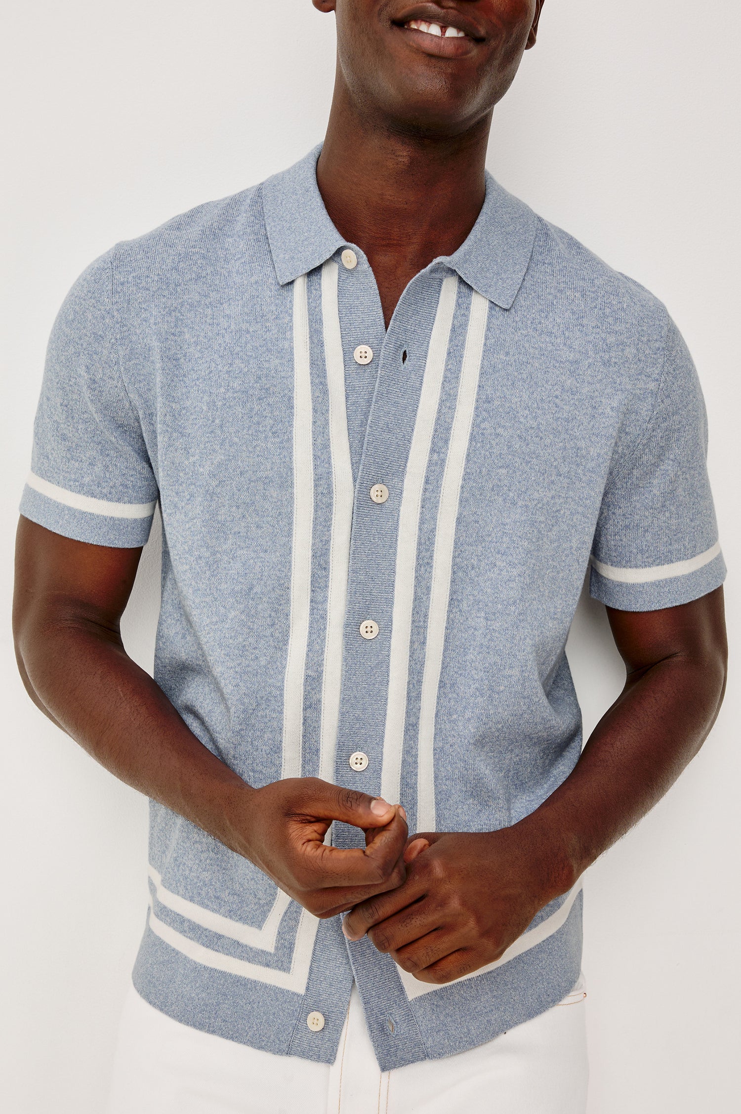 Leo Sweater Polo in Yarn-Dyed Cotton Blend Knit With Collar, Front Buttons, Short Sleeves, and Classic Fit in Sky White Colorway - Upper Body Front Close Up View Featured on Model