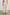 Leon Crop Pant with a Smocked Waistband and Two Front Seam Pockets in Flax Colorway - Back View Featured on Model