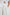 Leon Cotton Gauze Pant With Hemline Slit And Elastic Waist In Colorway White - close up of details on model