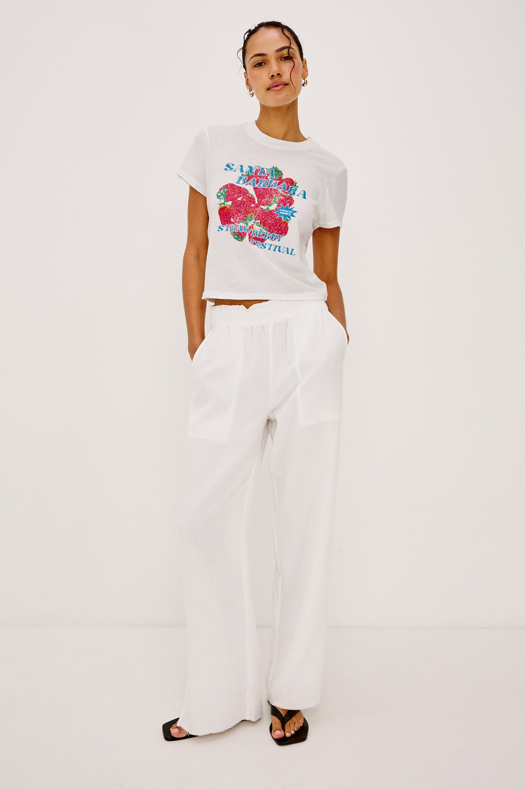 Leon Crop Pant in Double Gauze Cotton With Wide Straight Legs, Side Slits, and Smocked Waistband in White Colorway - Full Body Front View Featured on Model
