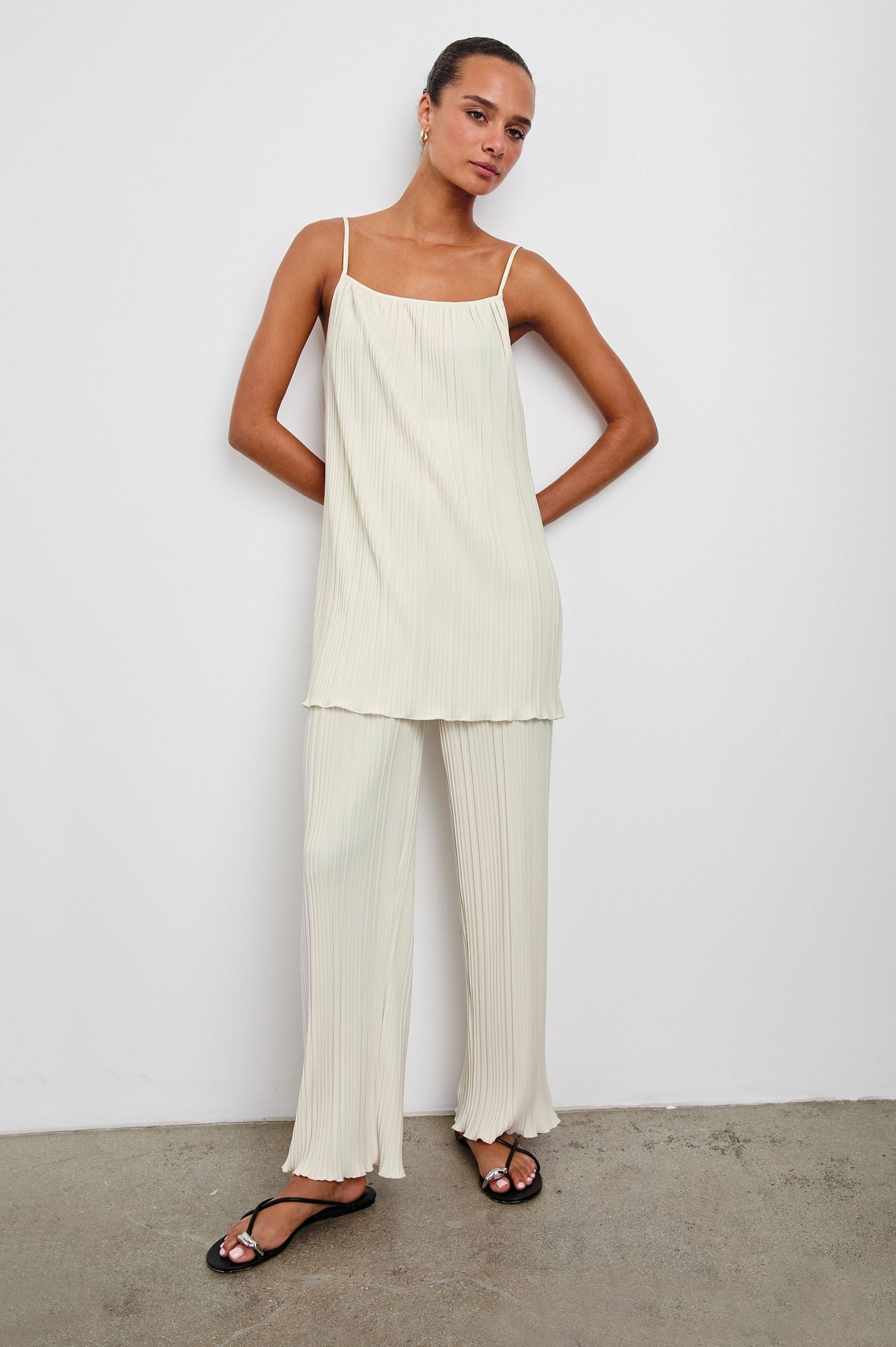 Liana Micro-Pleated Pants with Elastic waist in Ivory Colorway - Front Full Body View Featured on Model 