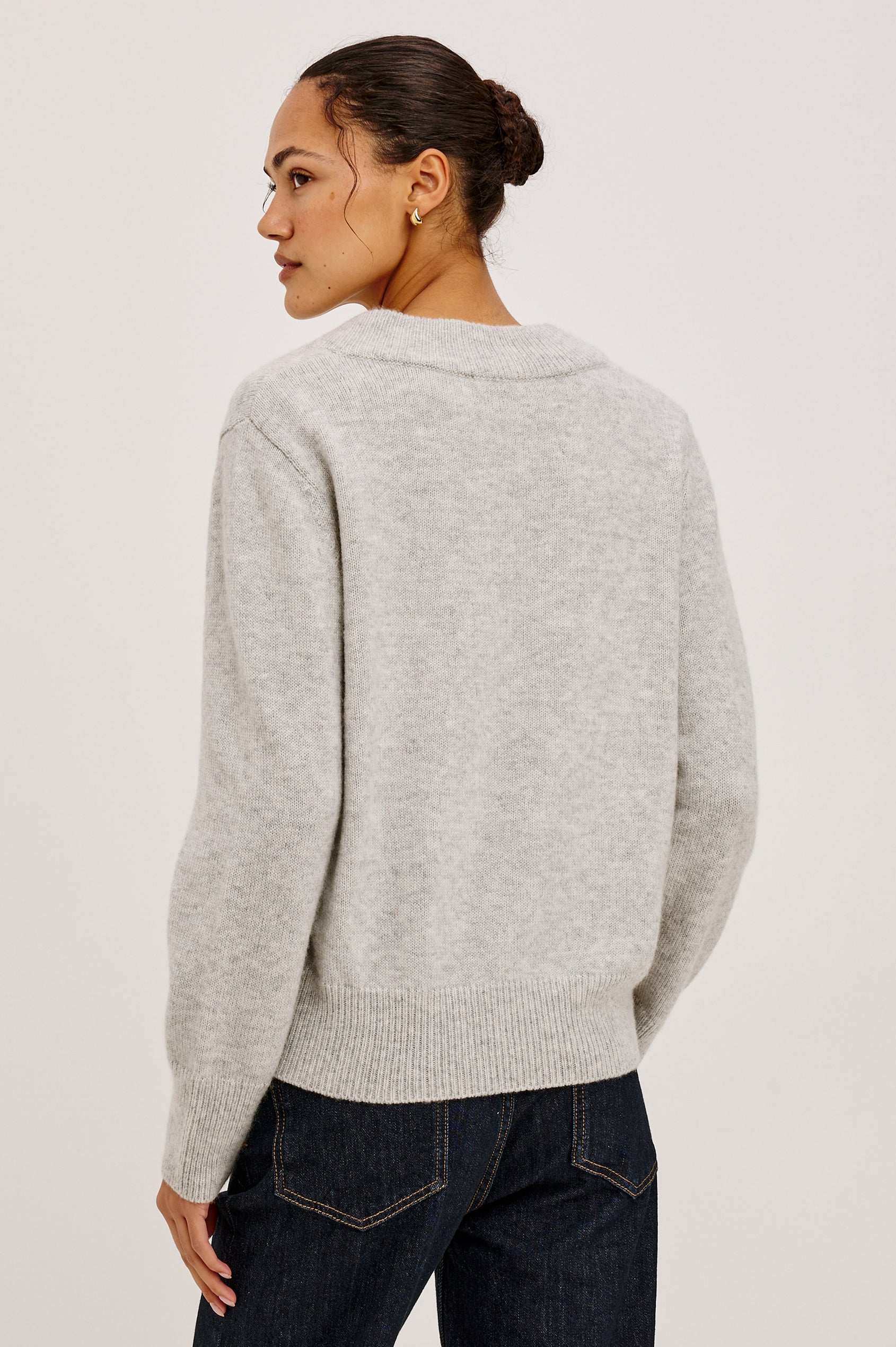 Lidya Sweater in Wool-Cashmere Knit Blend With V-Neckline, Loose Relaxed Fit, Long Sleeves, and Ribbed Trim in Heather Grey Colorway - Upper Body Back View Featured on Model