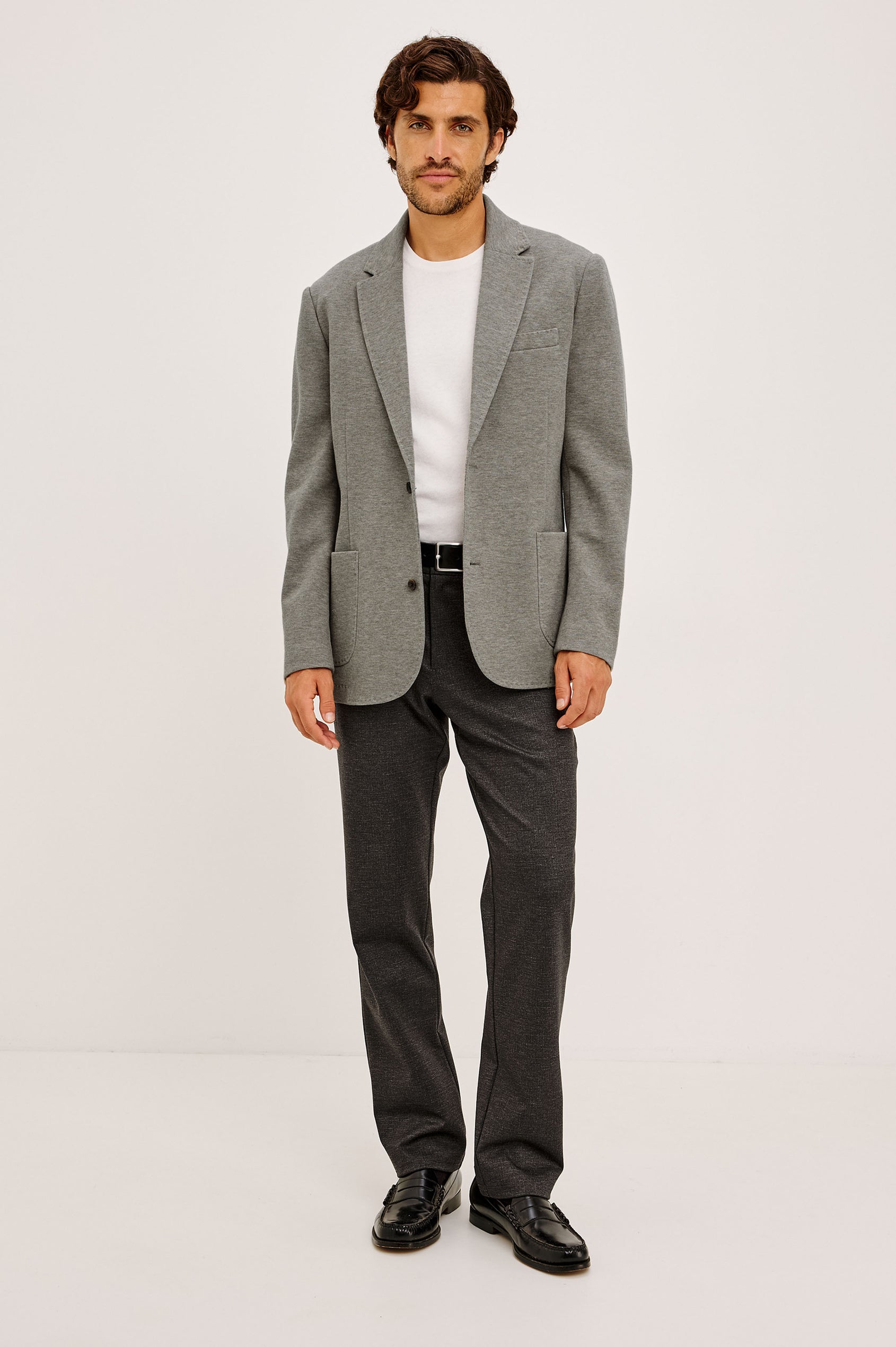 Lorenz Blazer in Ponte Jersey With Single-Breasted Design, Relaxed Fit, Jersey Lining, Notched Lapels, Chest Welt Pocket, Side Patch Pockets, Button-Cuff Long Sleeves, and Double Back Vents in Walnut Heather Colorway - Full Body Front View Featured on Model