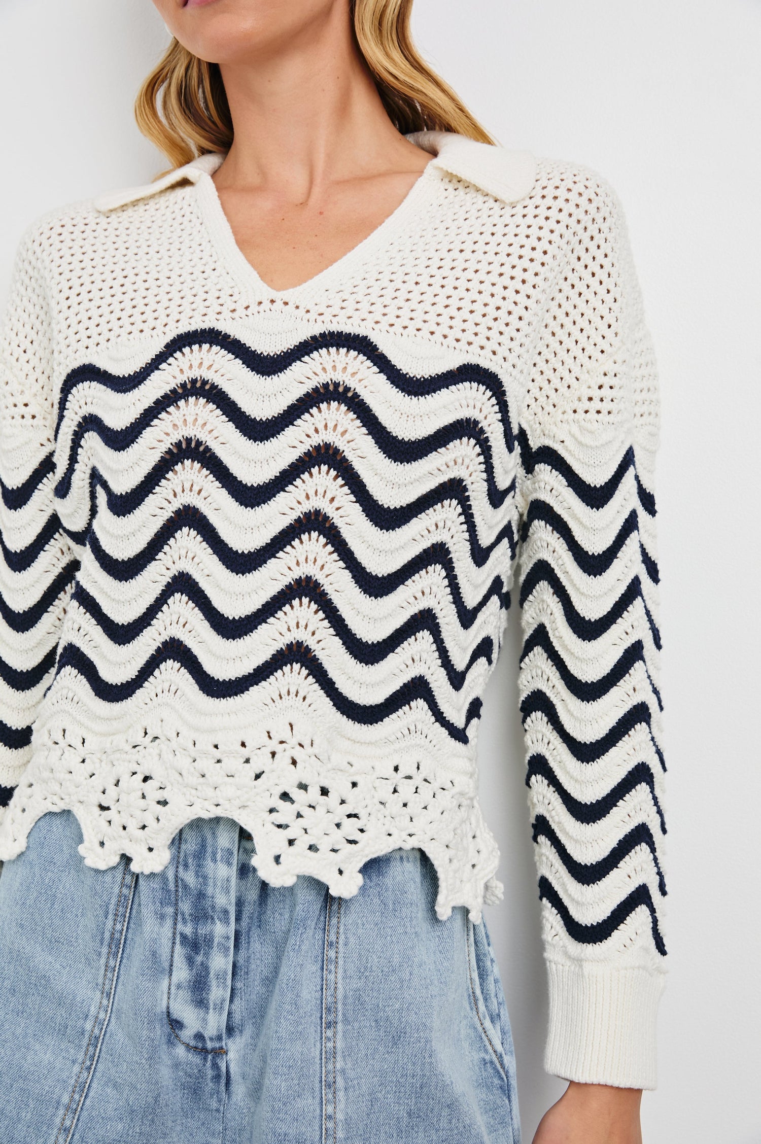 Louise Long-Sleeve, V-Neck Sweater with Collar, Floral Scalloped Hem, Open-Knit Crochet with a Solid Band at the Center in Wave Stripe Colorway, Navy waves on white - Front View on Model
