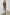 Luciana Ribbed, Long Sleeve Midi Dress with a V Neck Placket with a Collar, and a Side Slit in Latte Colorway - Front Full Body View Featured on Model 