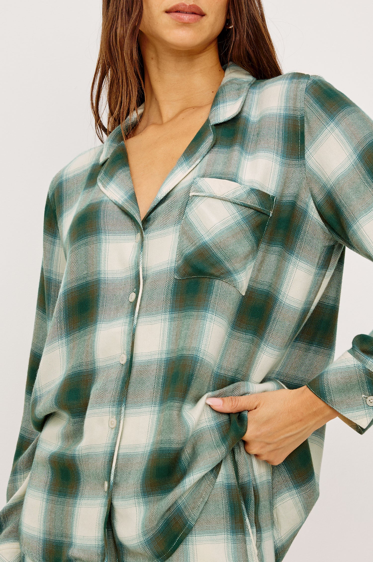 Luna Pajama Set in Signature Rayon With Button-Up Collared Shirt With Front Buttons, Long Sleeves, Chest Patch Pocket and Matching Pant With Side Pockets and Drawstring Waist Ties in Olive Teal Colorway - Upper Body Close Up Front View Featured on Model