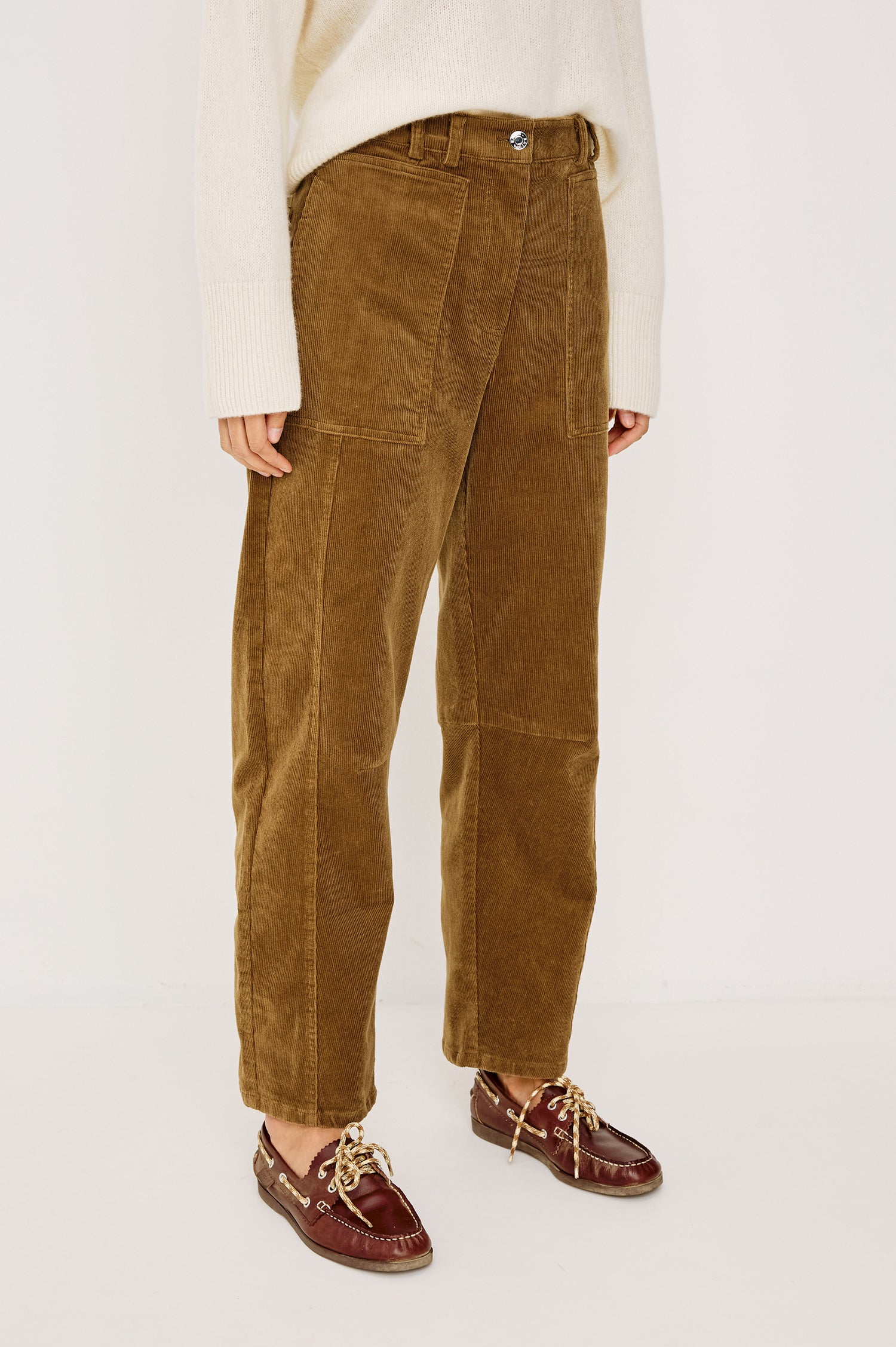 Lunar Pant in Stretch Corduroy With Relaxed Straight Legs, Zip-Fly Closure, Belt Loops, Seam Detailing, Carpenter-Style Side Pockets, and Back Pockets in Ginger Colorway - Lower Body Front View Featured on Model