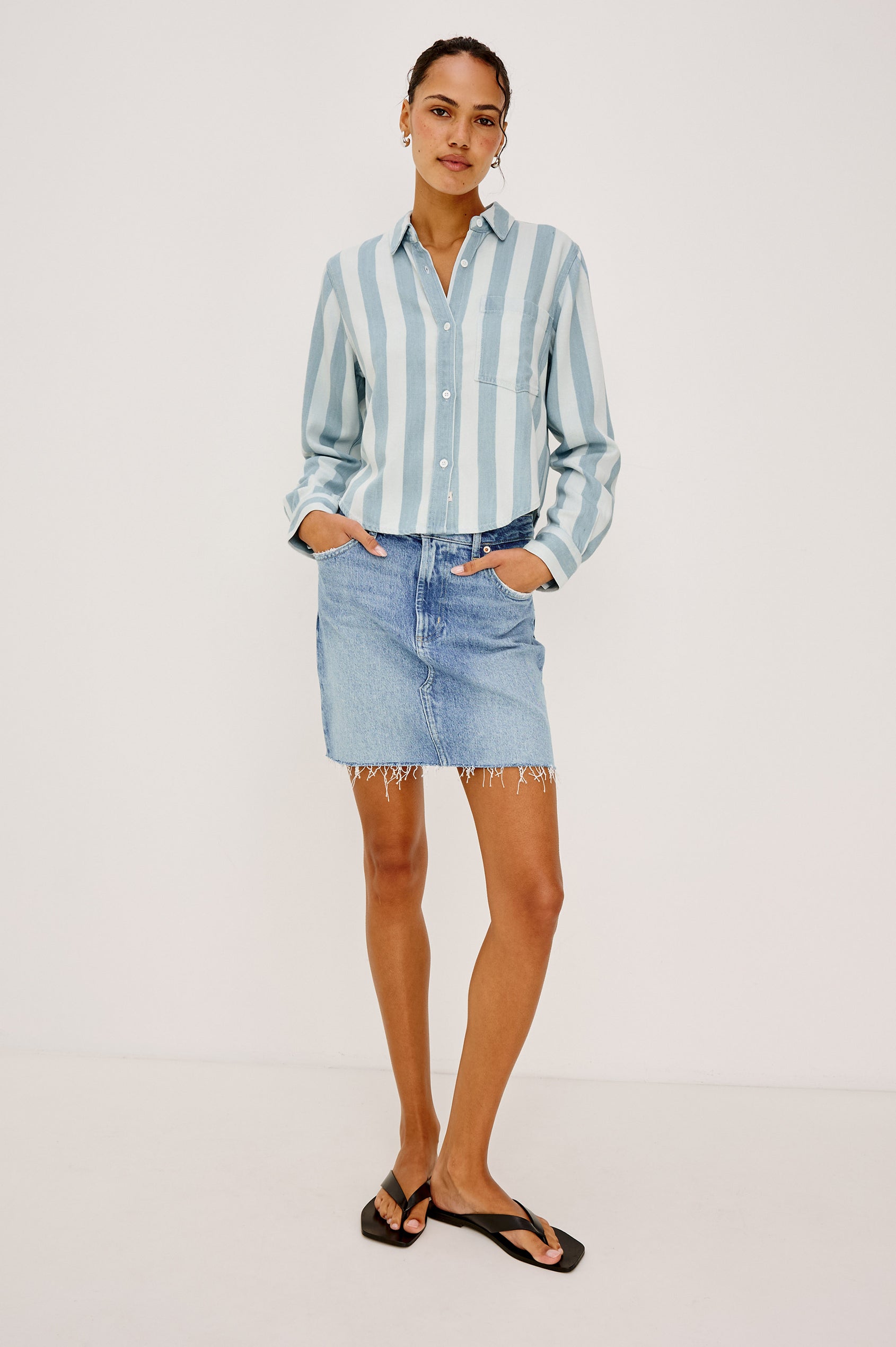 Malin Cropped Boxy Shirt in Signature Soft Rayon With Loose Twill Weave With Collar, Front Buttons, Long Sleeves, Chest Patch Pocket in White and Blue Stripe Colorway - Full Body Front View Featured on Model