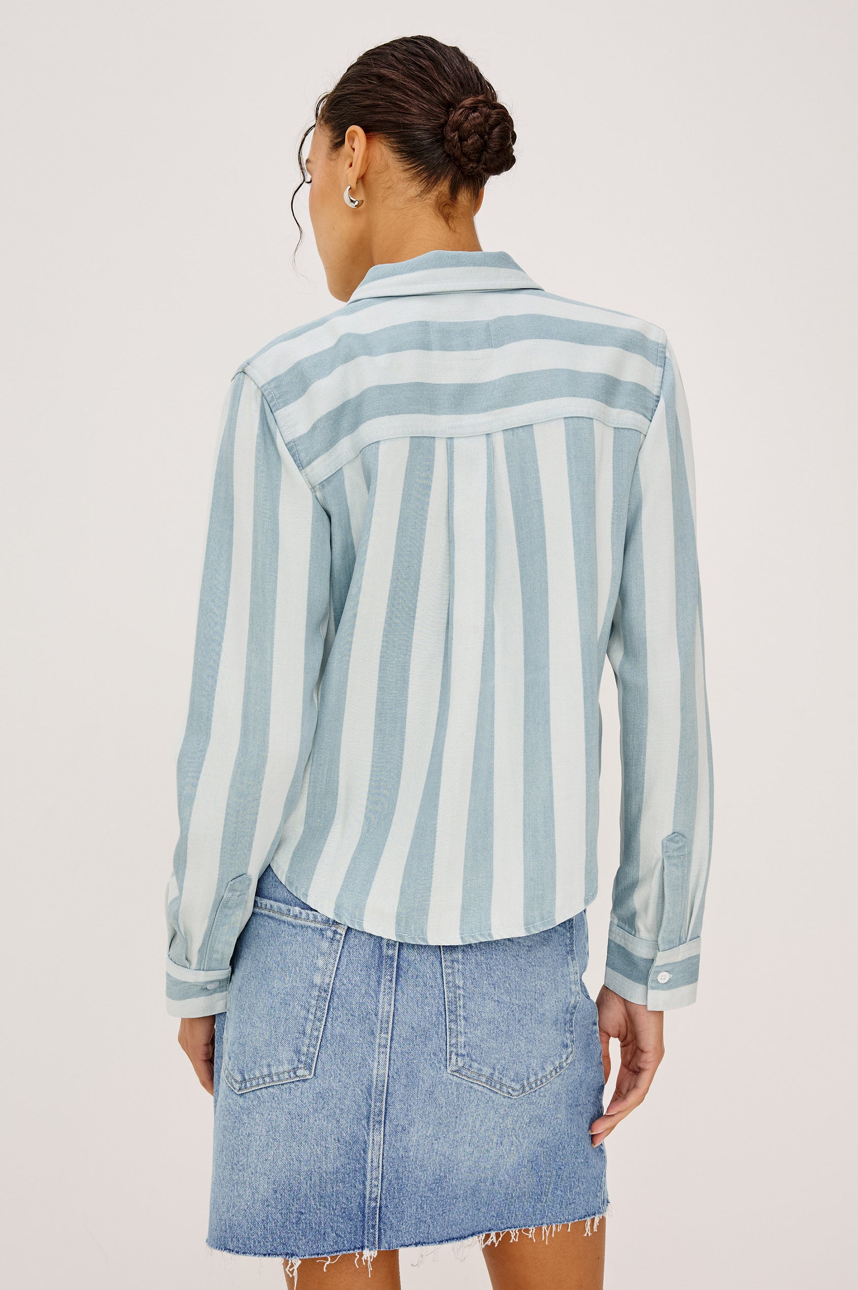 Malin Cropped Boxy Shirt in Signature Soft Rayon With Loose Twill Weave With Collar, Front Buttons, Long Sleeves, Chest Patch Pocket in White and Blue Stripe Colorway - Upper Body Back View Featured on Model