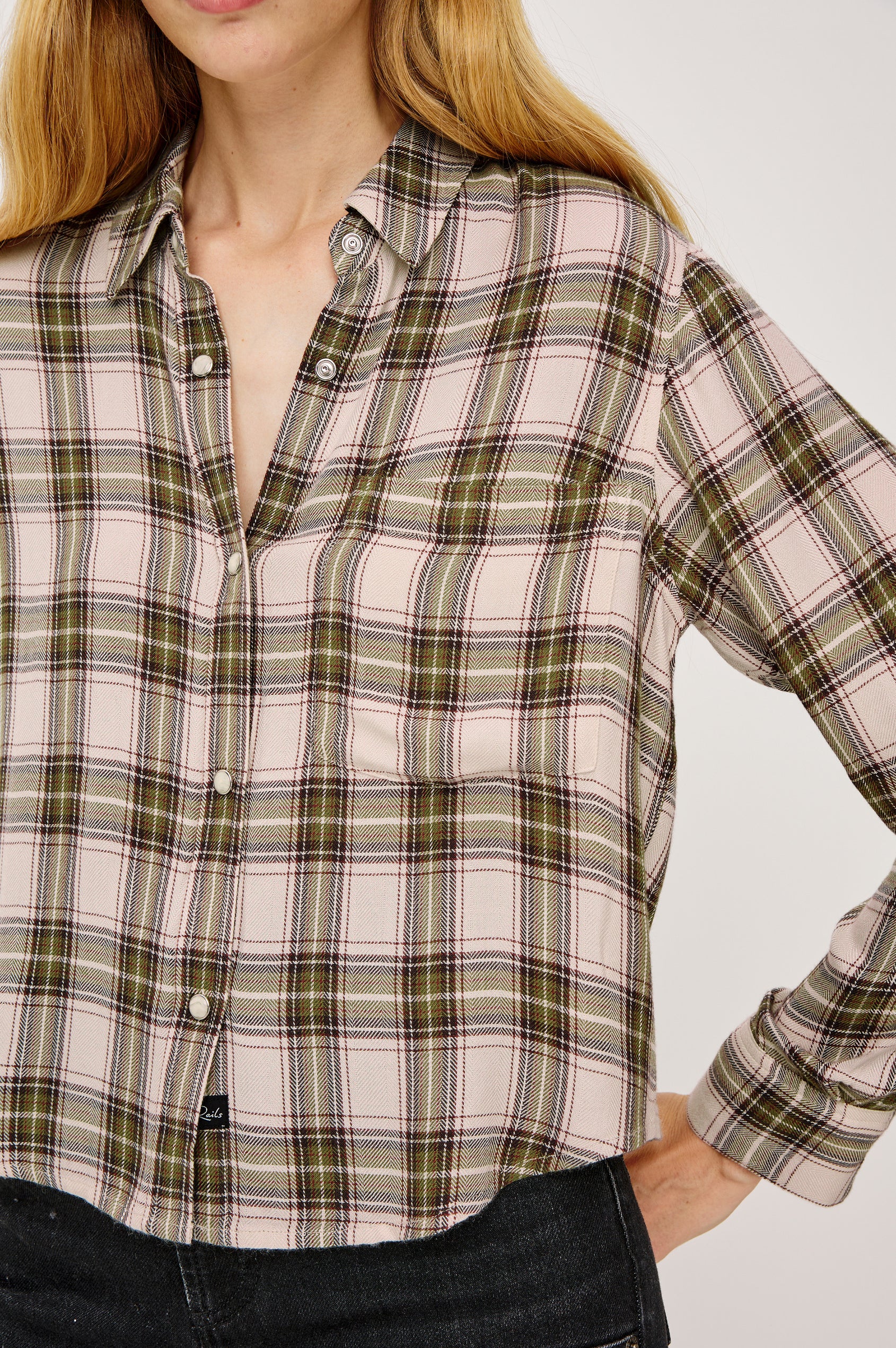 Malin Cropped Boxy Shirt in Signature Soft Rayon With Loose Twill Weave With Collar, Front Buttons, Long Sleeves, Chest Patch Pocket in Olive Brown Colorway - Upper Body Close Up View Featured on Model
