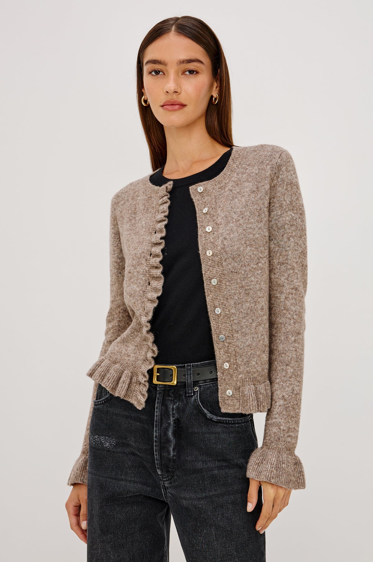 Mandy Sweater in Cashmere-Cotton-Wool Blend Knit Front Buttons, Long Sleeves, Classic Slightly Cropped Fit, and Ribbed Ruffle Trim in Heather Latte Colorway - Front Crop View Featured on Model.