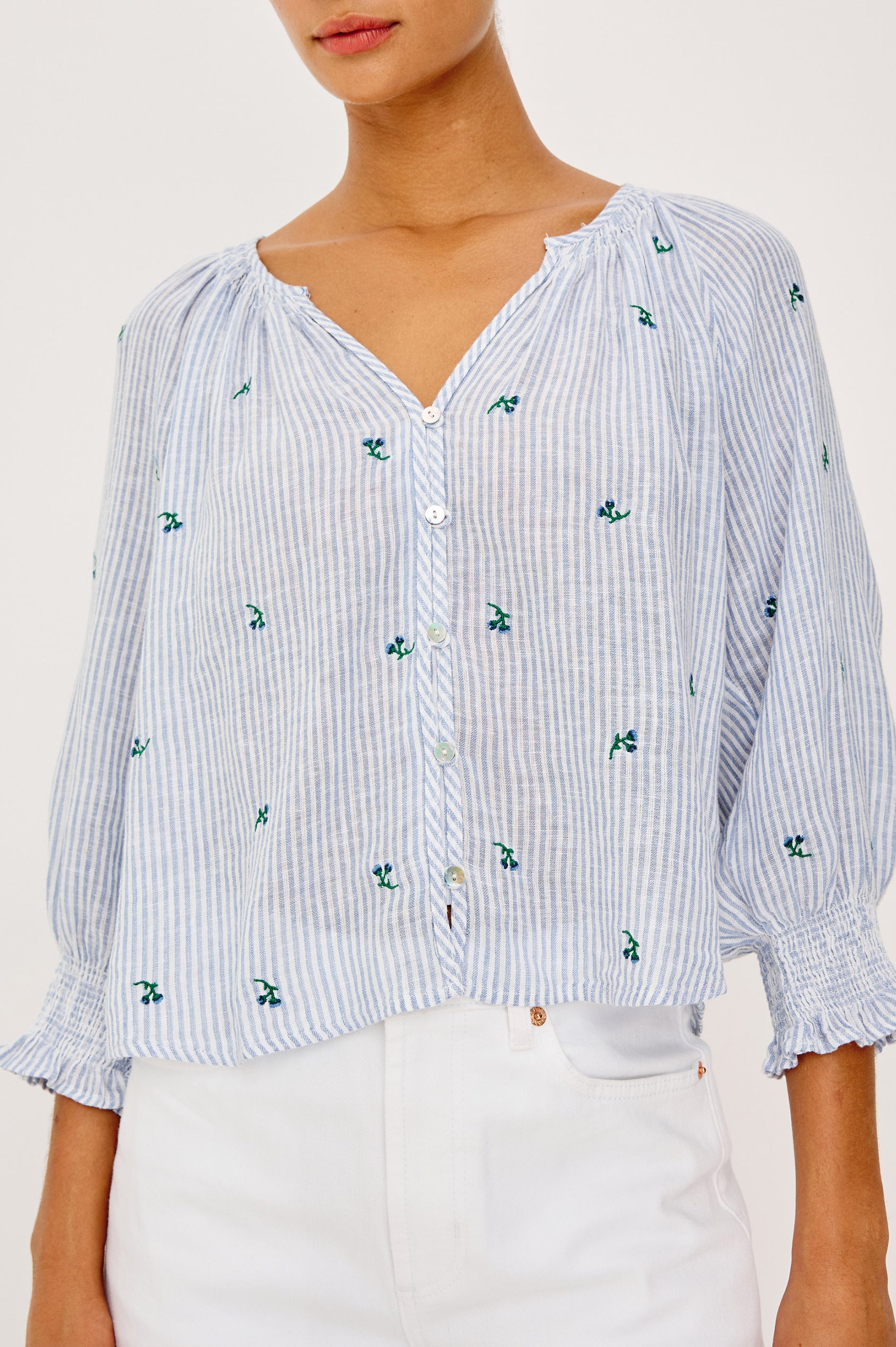 Mariah Peasant Style Bouse Top in Beach Cotton With Split V-Neck Collar, Front Buttons, Smocked Cuffs, and Loose Fit in Bluebell Embroidered Stripe Colorway - Upper Body Front View Featured on Model
