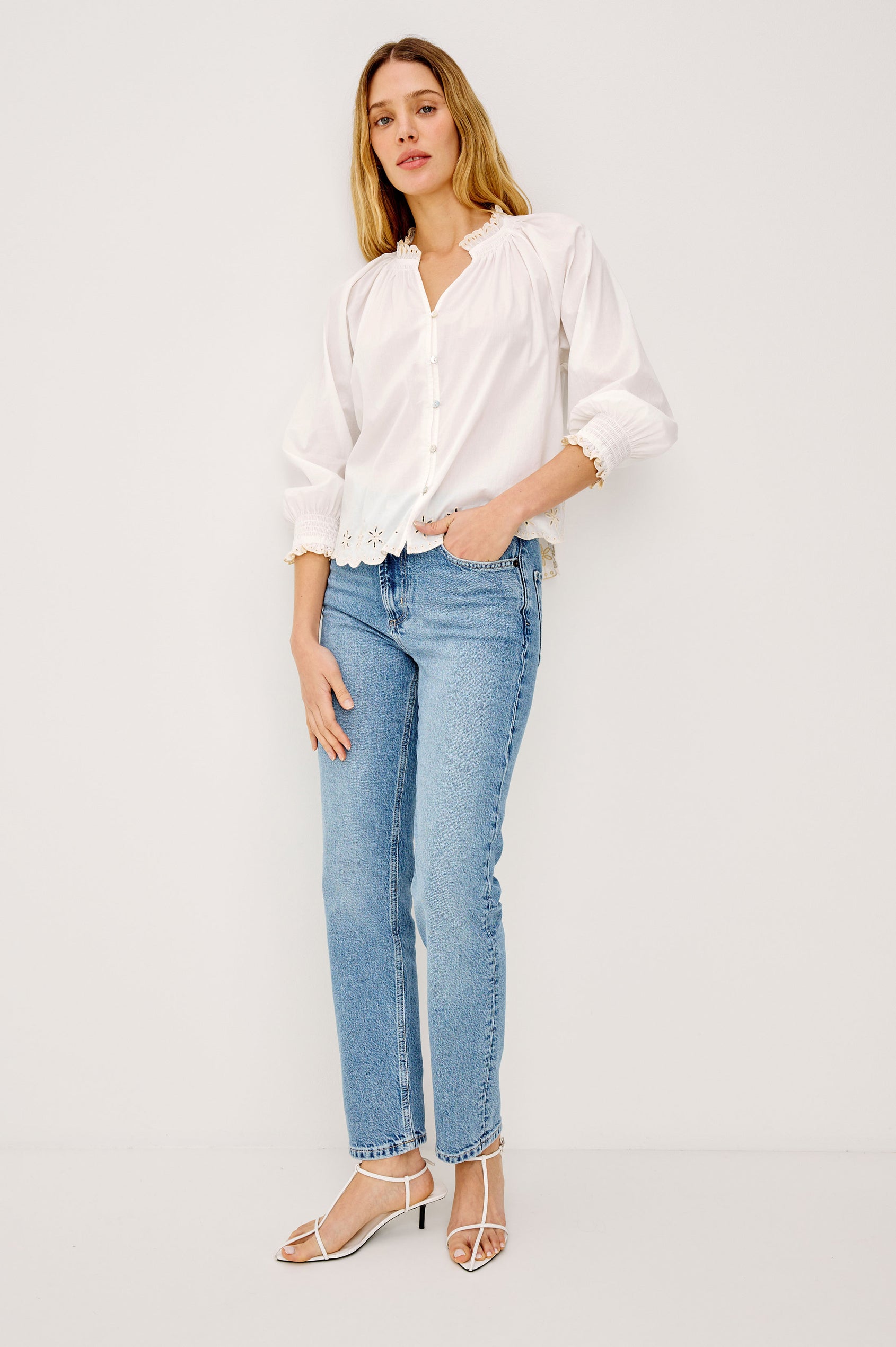 Mariah Peasant Style Bouse Top in Beach Cotton With Split V-Neck Collar, Front Buttons, Smocked Cuffs, and Loose Fit in Oat Embroidery - Full Body Front View Featured on Model