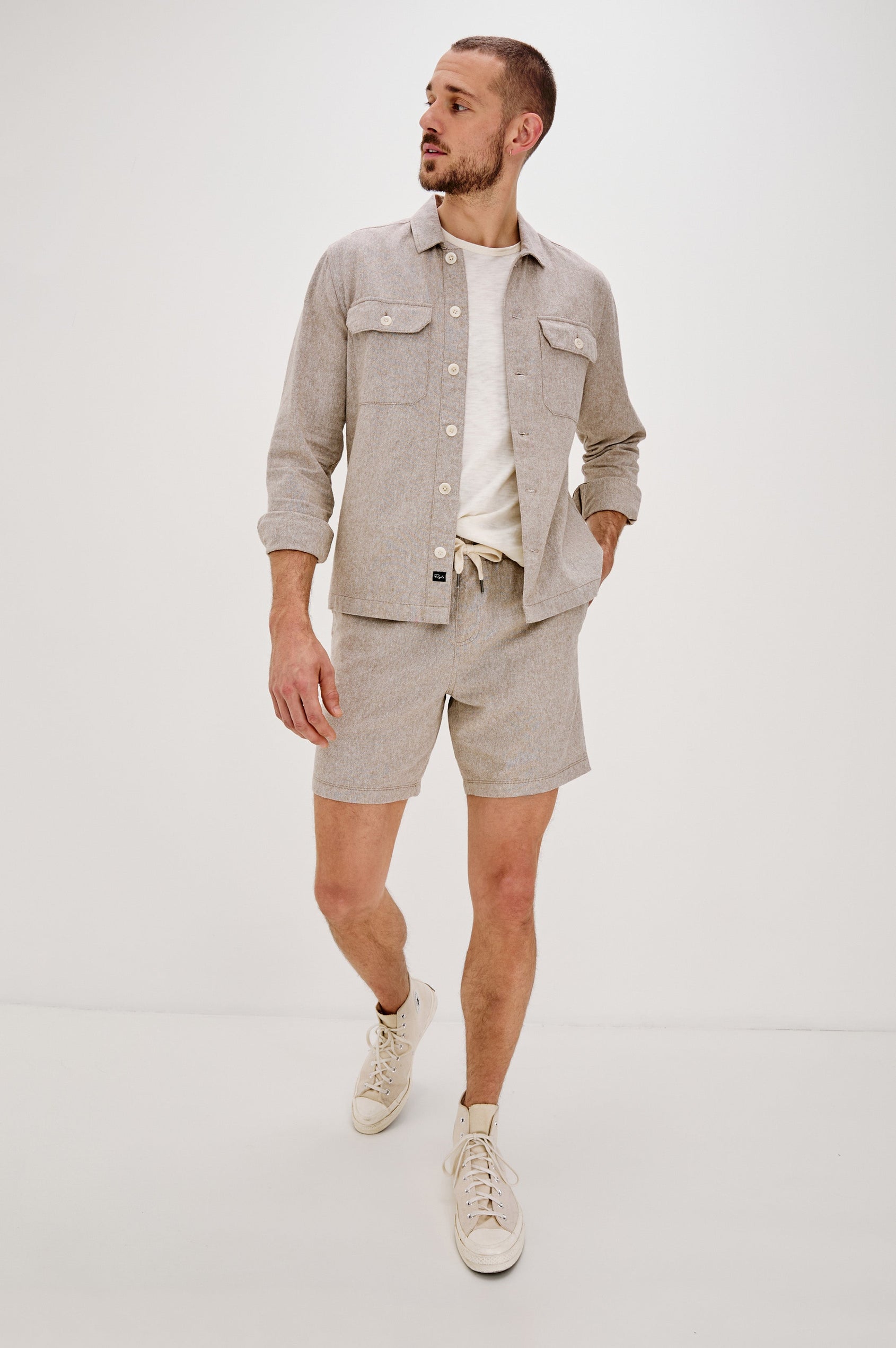 Martin Pull on Short with a an Elastic and Drawstring Waist and Side Pockets in Bulgur Oat Colorway. Front View Shown on Model.