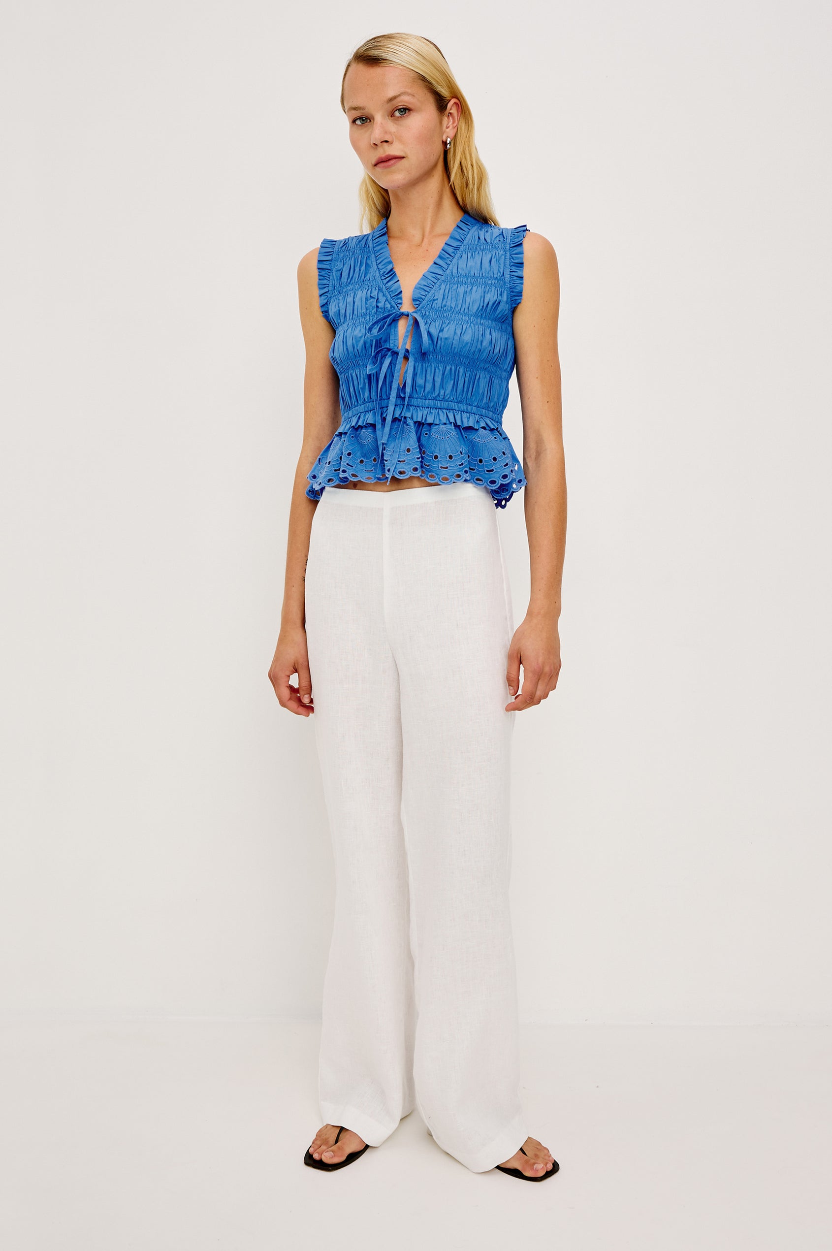 Martine Cropped Sleeveless Top in Heavy Cotton Poplin With Plunging V-Neckline With Adjustable Ties and Ruffle Trim in Harbor Blue Colorway - Full Body Front View Featured on Model