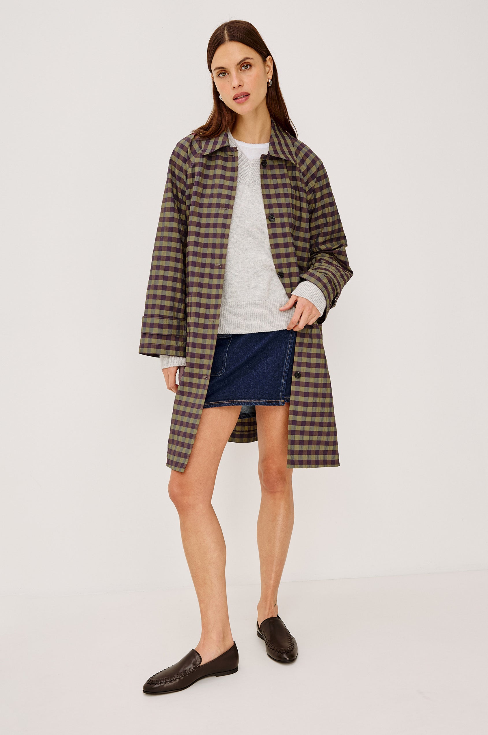 Mattie Trench Jacket in Lightweight Crinkle Nylon With Slightly Oversized Fit, Point Collar, Front Buttons, Front Patch Pockets, and Side Slits in Tapenade Check Colorway - Full Body Front View Featured on Model