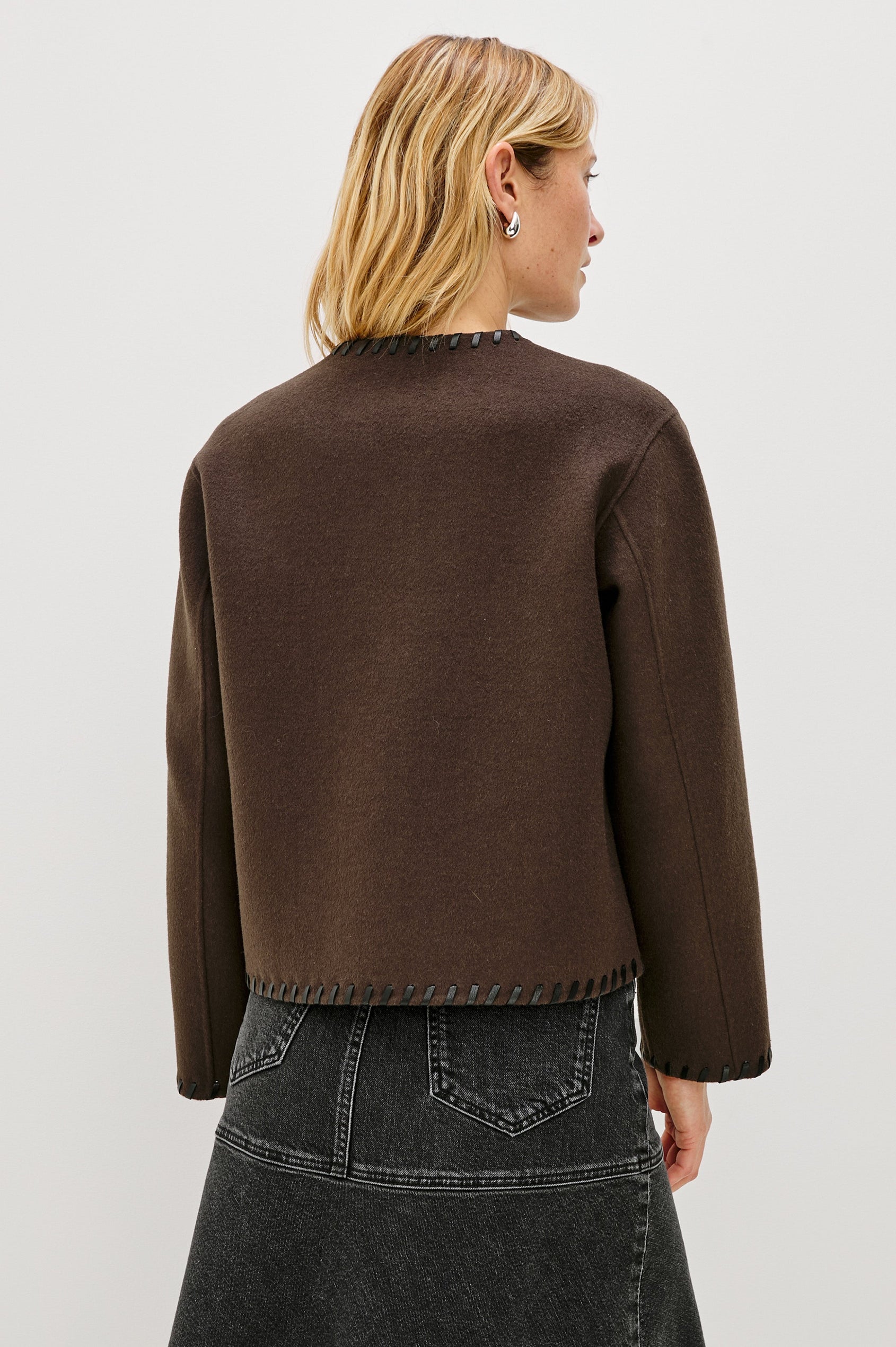 Melanie Jacket with Button Closure and Two Front Patch Pockets in Dark Brown Colorway, with Leather Whipstitching along the Trim and Pockets - Back View Featured on Model