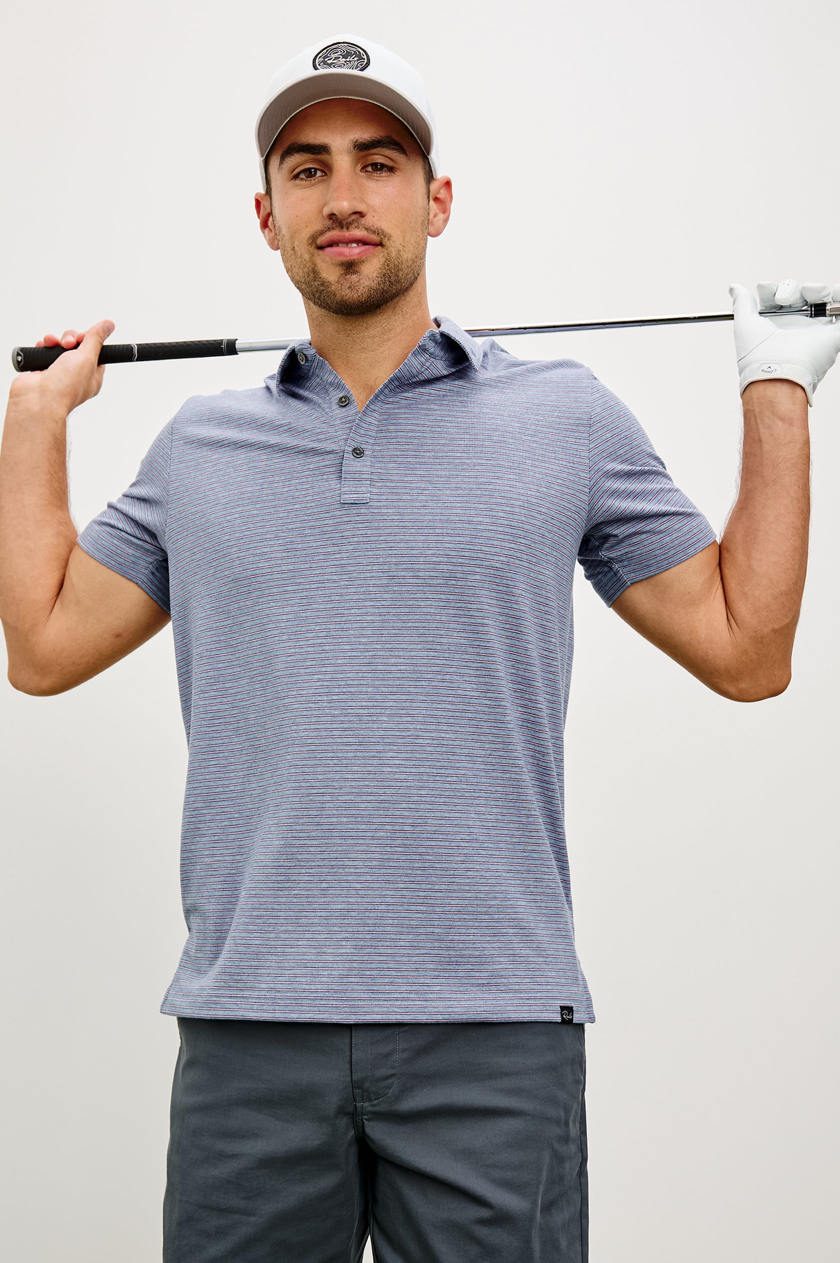 Merced Golf Polo in TENCEL™ Poly Blend With Collar, Quarter Placket, Short Sleeves, and Classic Fit in Hibiscus Mirage Stripe Colorway - Upper Body Front View Featured on Model