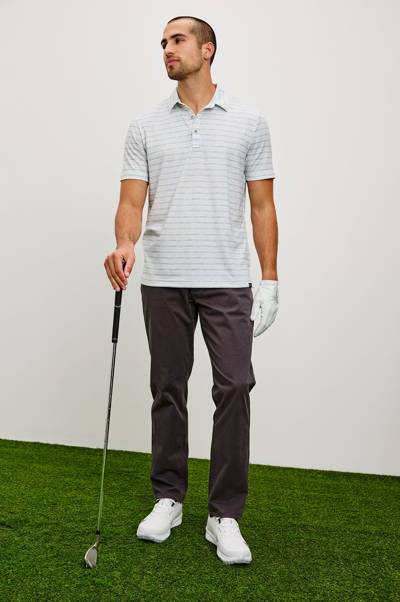 Merced Golf Polo in TENCEL™ Poly Blend With Collar, Quarter Placket, Short Sleeves, and Classic Fit in Shashiko Border White Colorway - Full Body Front View Featured on Model