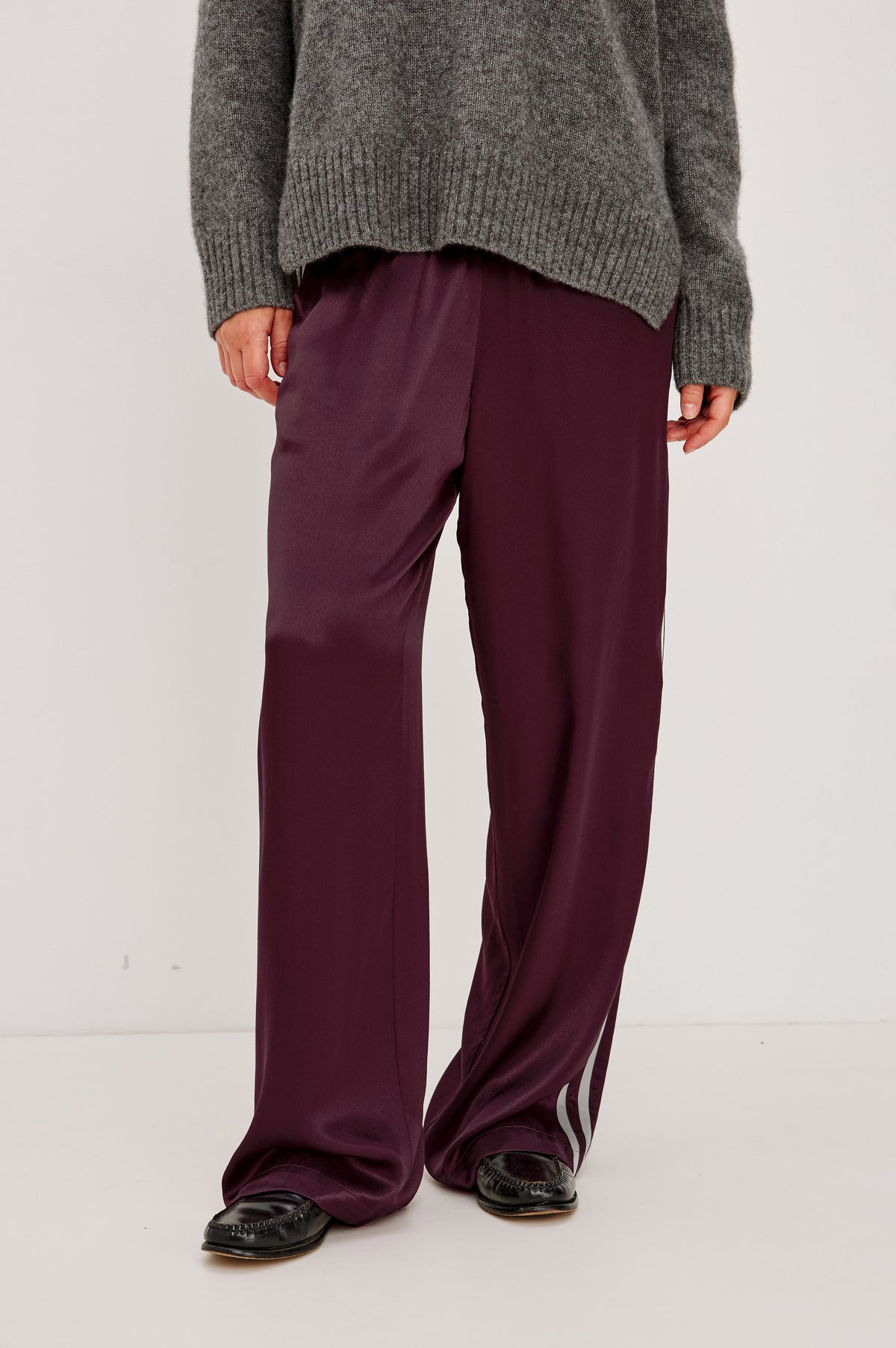 Merida Pant in Satin Back Crepe With Elastic Waistband, Side Pockets, and Wide Legs With Double Side Stripes in Wine Colorway - Lower Body Front View Featured on Model