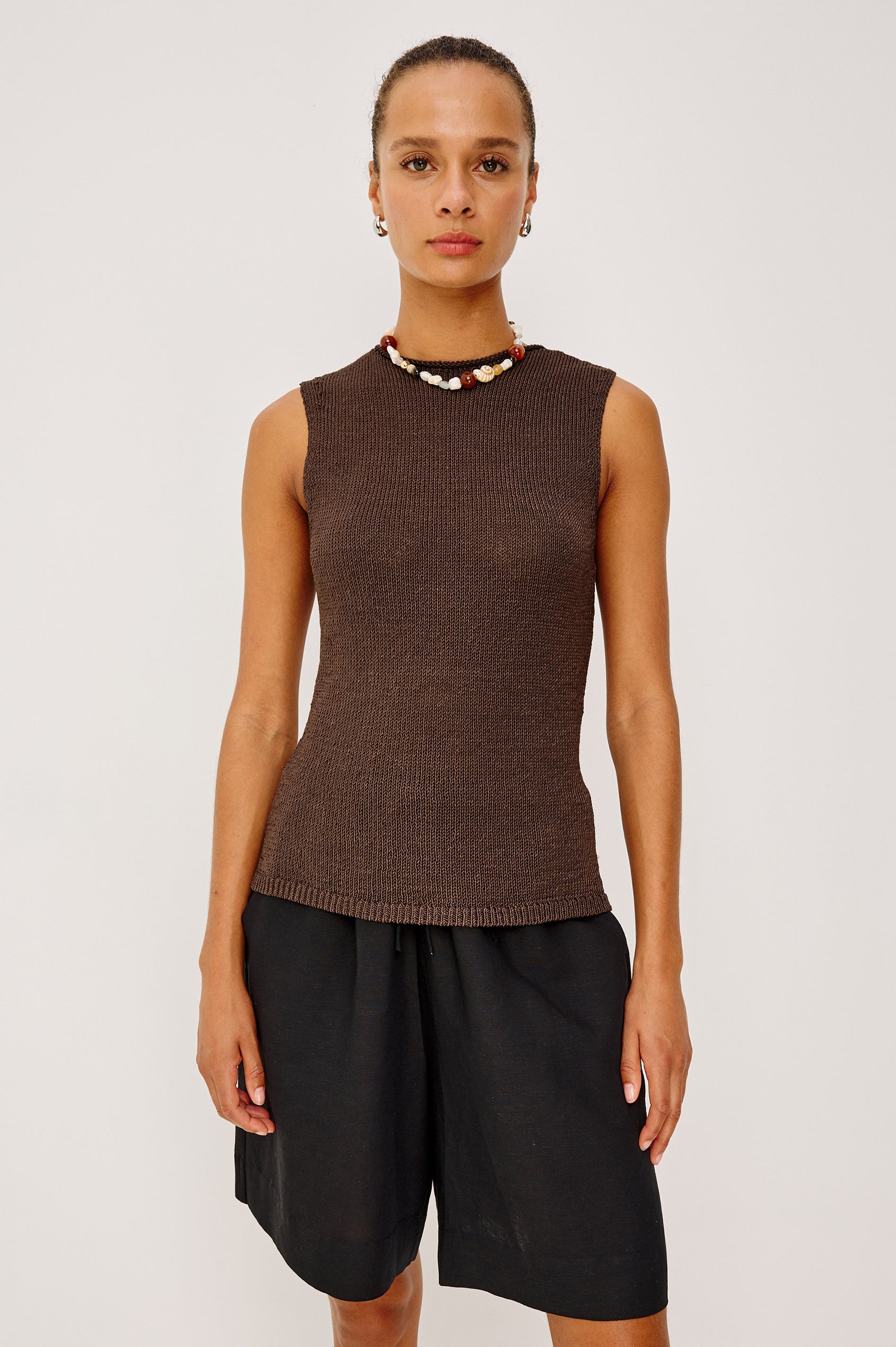 Merit Sleeveless Top in Viscose Blend Knit With Rolled Neckline, and Relaxed Body-Skimming Fit in Espresso Colorway - Upper Body Front View Featured on Model