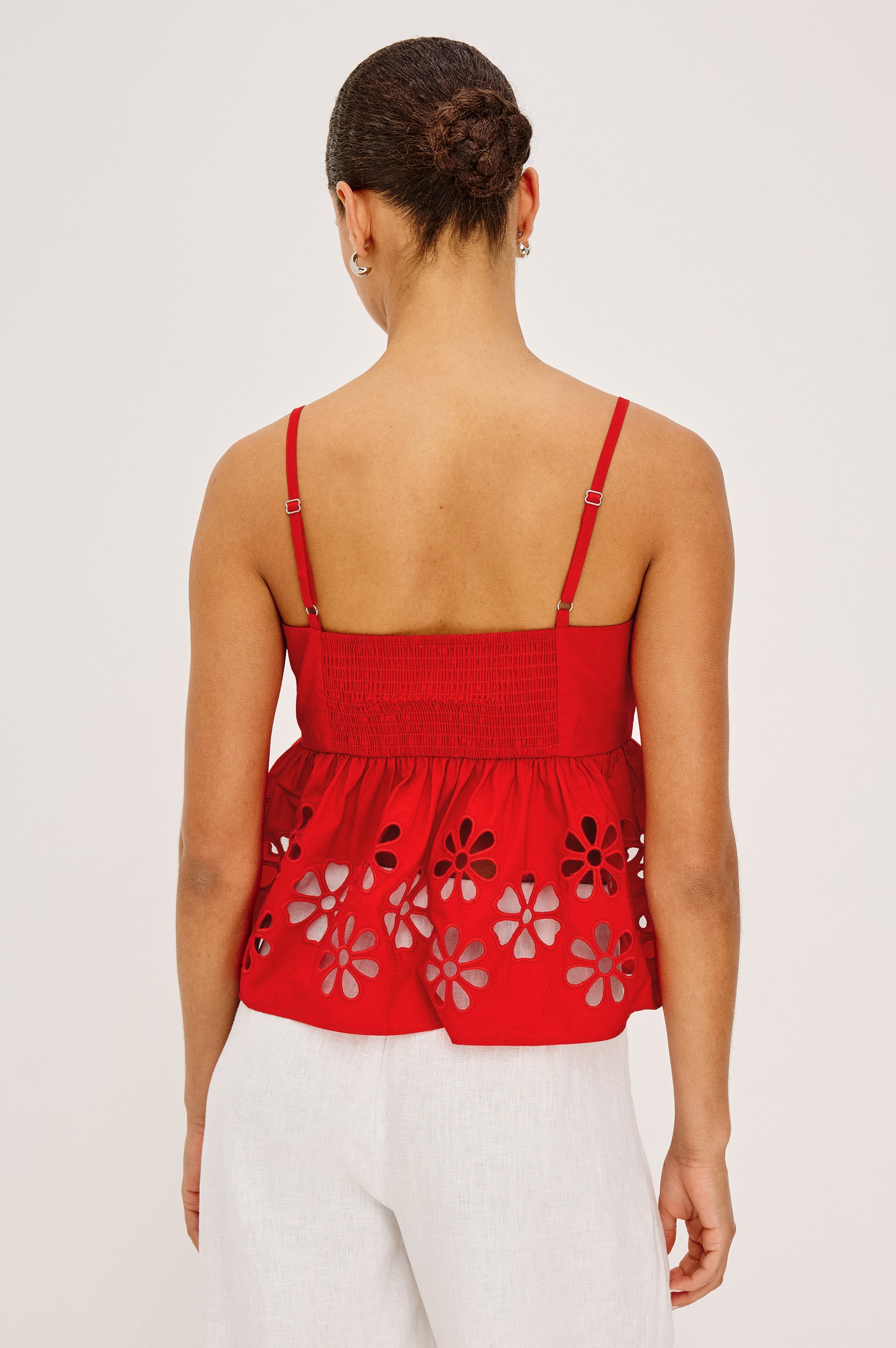 Meru Tank Top in Cotton Polin With Center Front Ruching, Peplum Embroidered Hem, and Smocked Back in Scarlet - Upper Body Back View Featured on Model