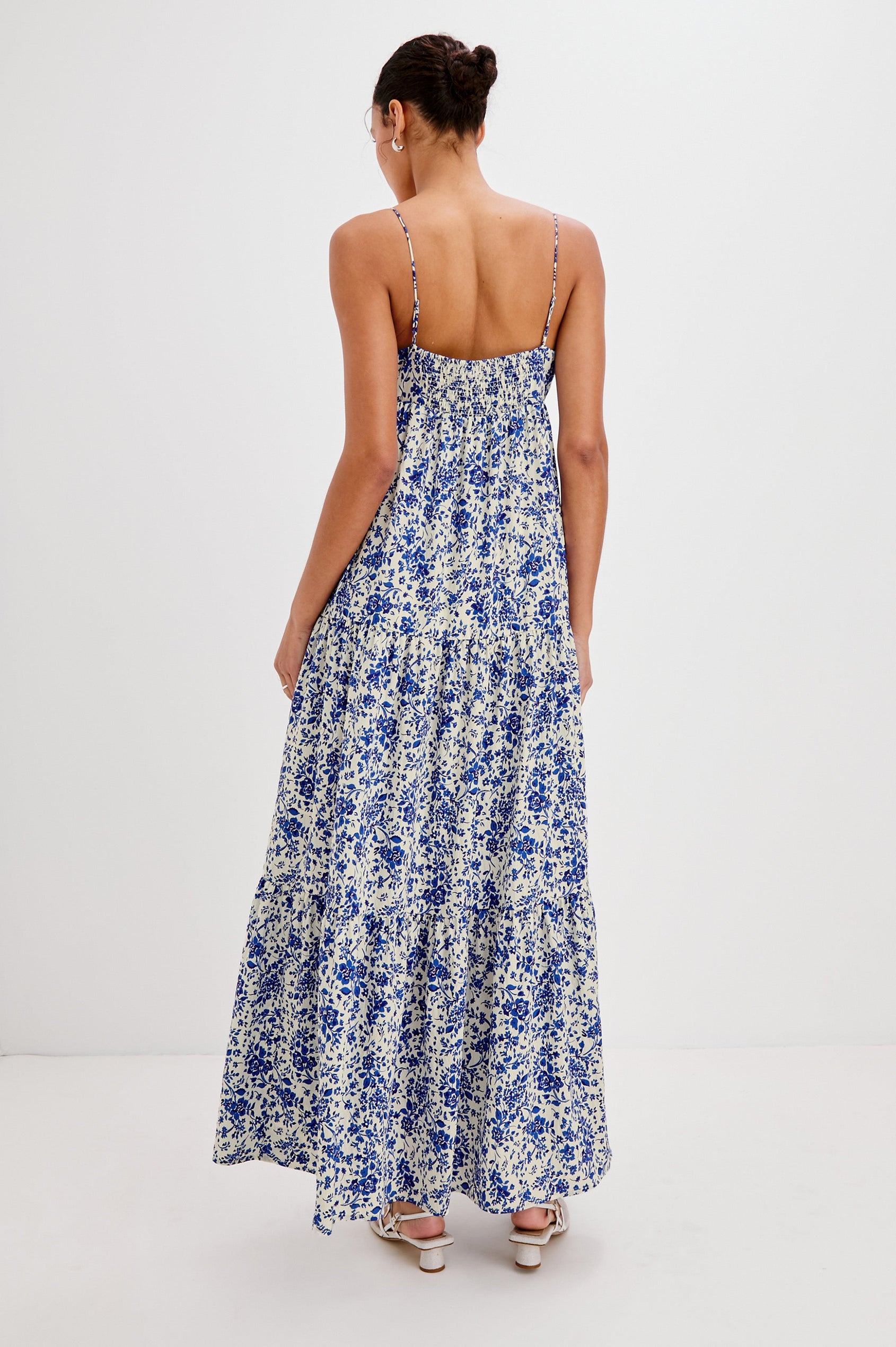 Mica Midi Tank Dress with Spaghetti Straps, a Keyhole at Center Front, Ties and a Tiered Skirt in Blue Marguerite Colorway. Back View Shown on Model.